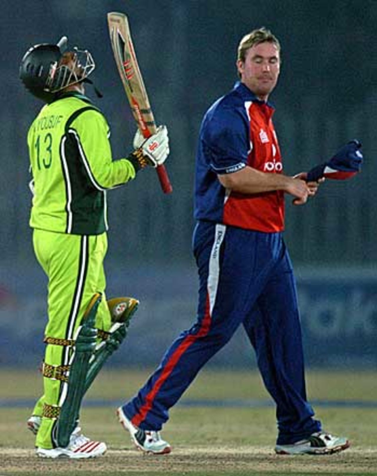 Mohammad Yousuf raises his bat, and eyes, to the heavens after reaching fifty, watched on by Ian Blackwell, Pakistan v England, 5th ODI, Rawalpindi, December 21, 2005