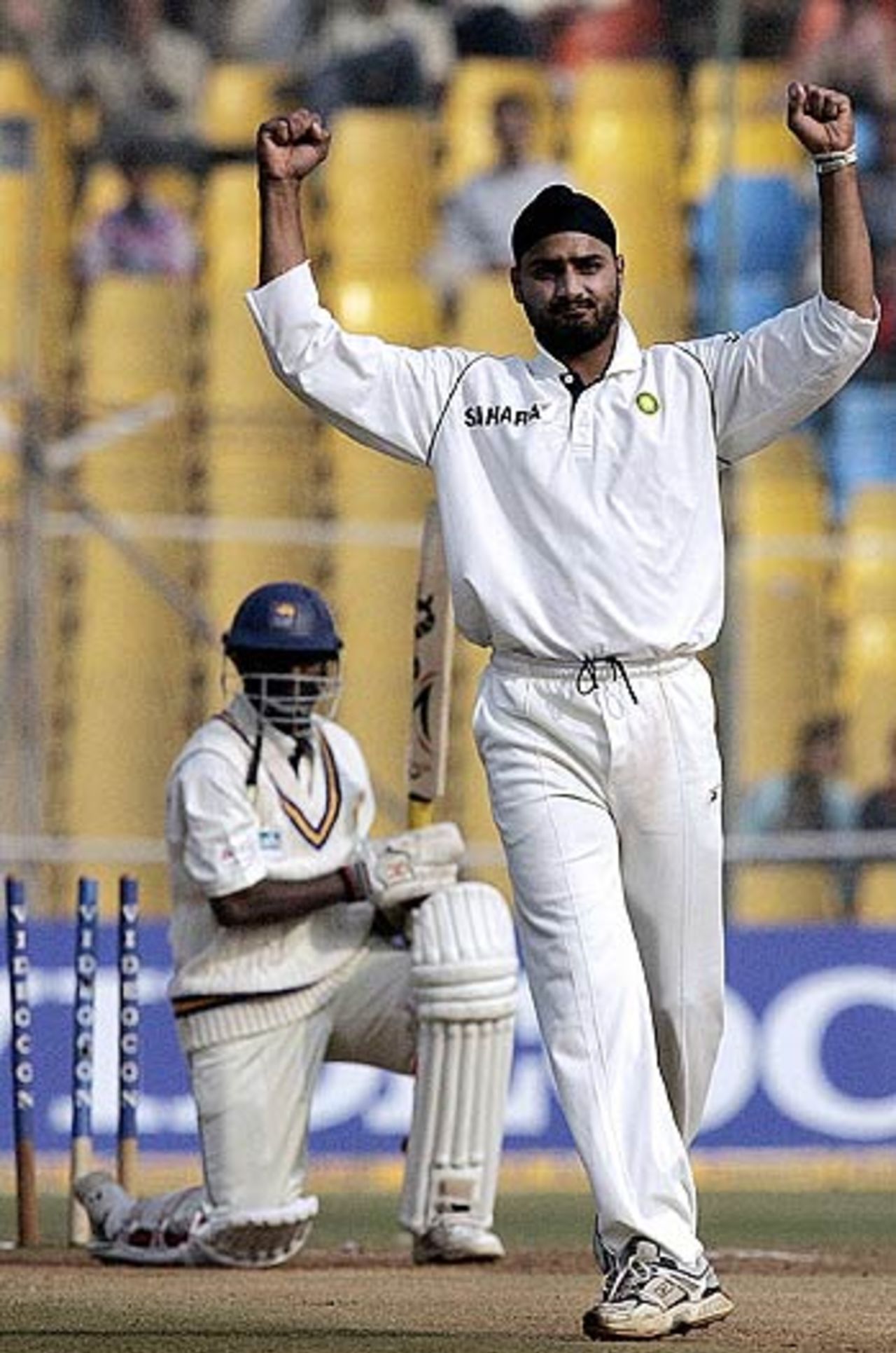 Harbhajan Singh celebrates after bowling out Muttiah Muralitharan, India v Sri Lanka, 3rd Test, Ahmedabad, Fifth day, December 22, 2005
