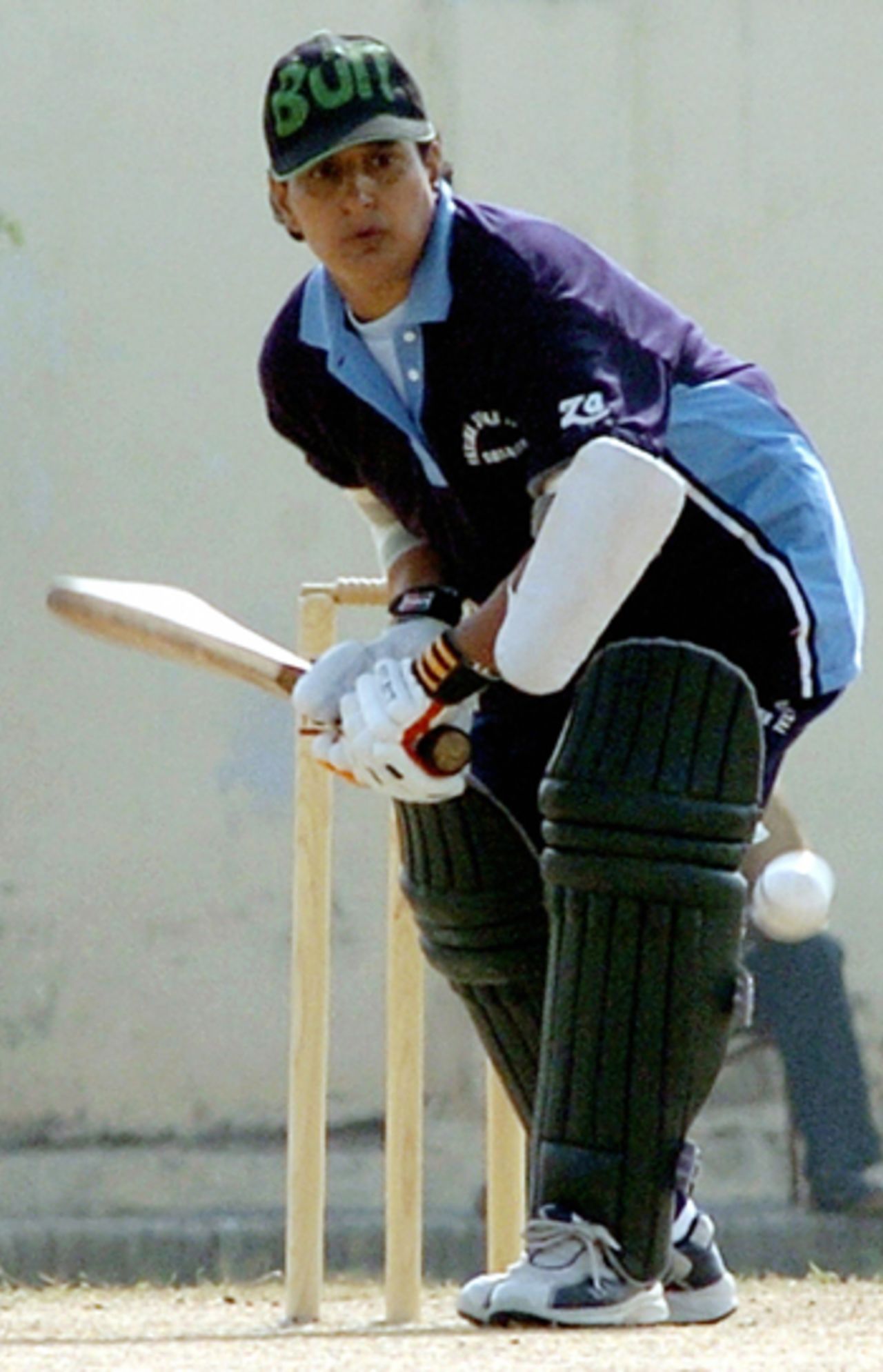 Pakistan's Samia Ahmed plays a shot during a practice match in Karachi, December 24,  2005