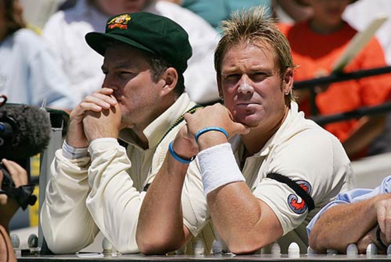 Shane Warne and Stuart MacGill strike pensive poses, Australia v South Africa, 2nd Test, Melbourne, 2nd day, December 27, 2005
