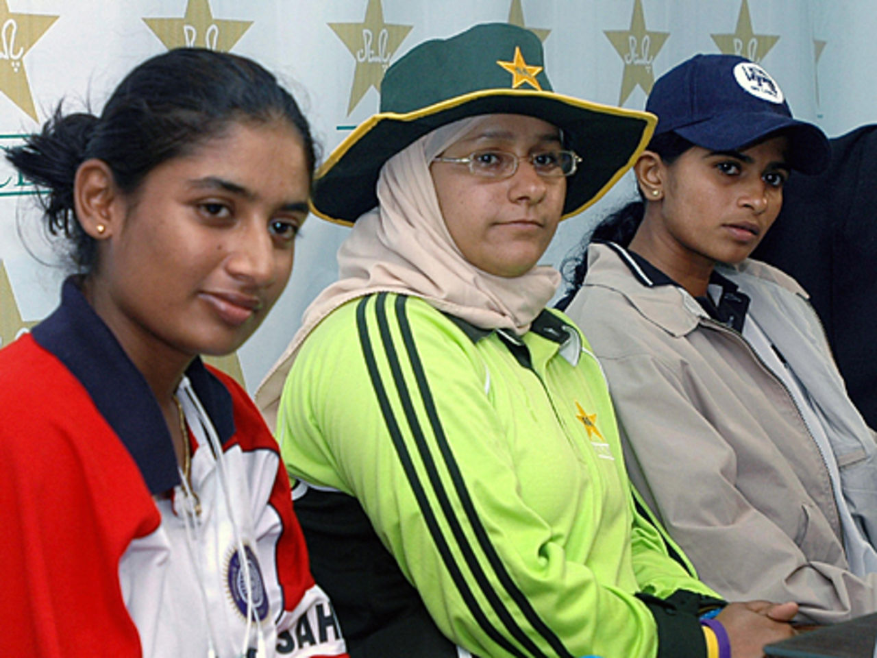 India's Mithali Raj, Pakistan's Sana Javed and Sri Lanka's Shsikala Siriwardene attend a press briefing for the Asia Cup, Karachi, December 27, 2005