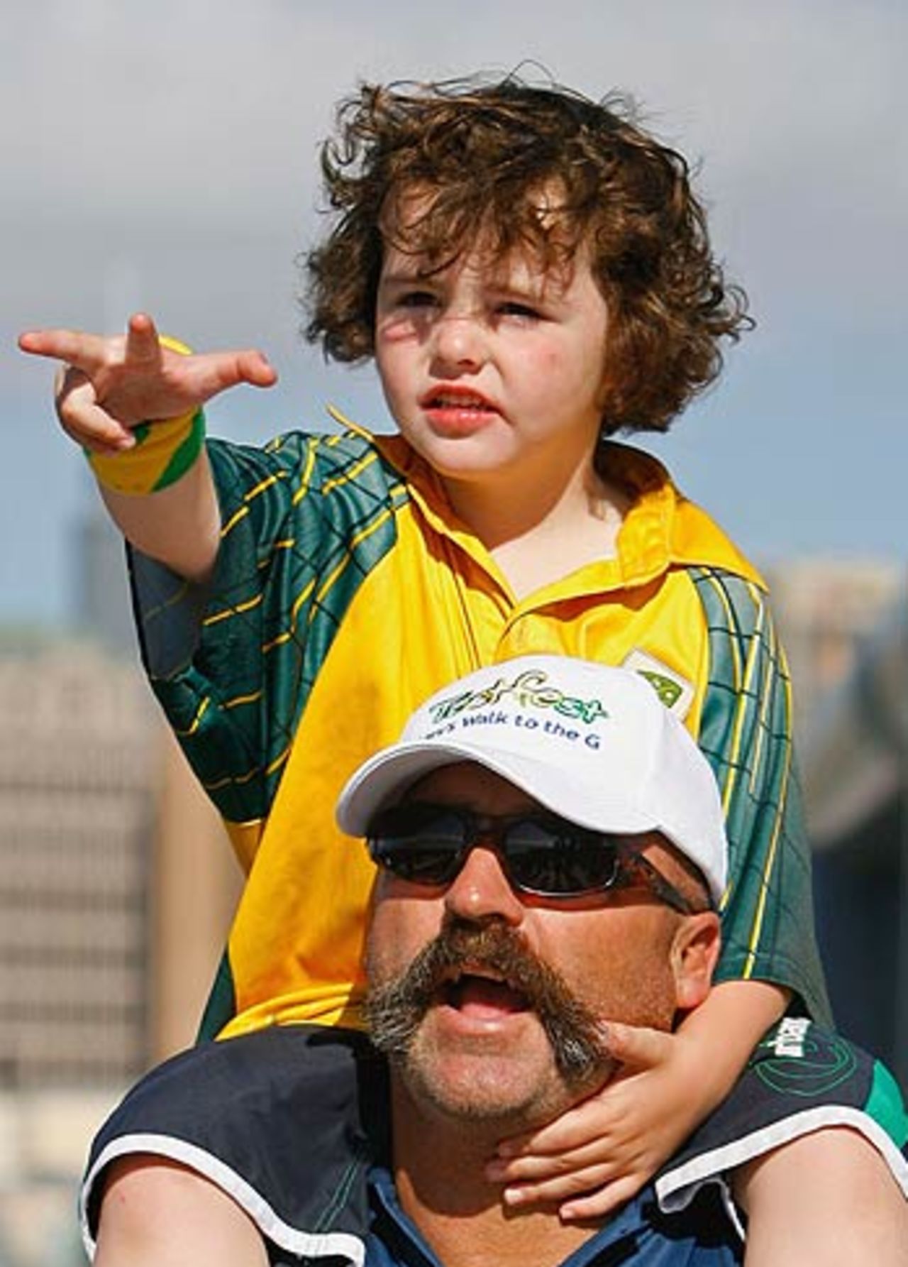 Merv Hughes and his son Scott arrive to watch the action, Australia v South Africa, 2nd Test, Melbourne, 3rd day, December 28, 2005