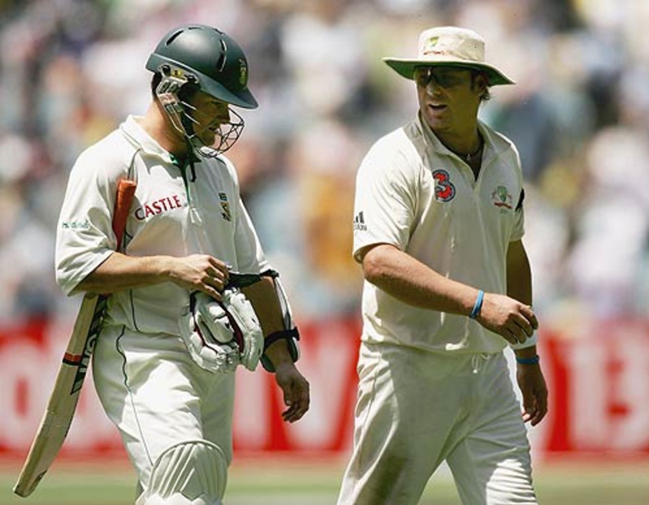 Shane Warne has a word - or two - for Mark Boucher as he walks off , Australia v South Africa, 2nd Test, Melbourne, 3rd day, December 28, 2005