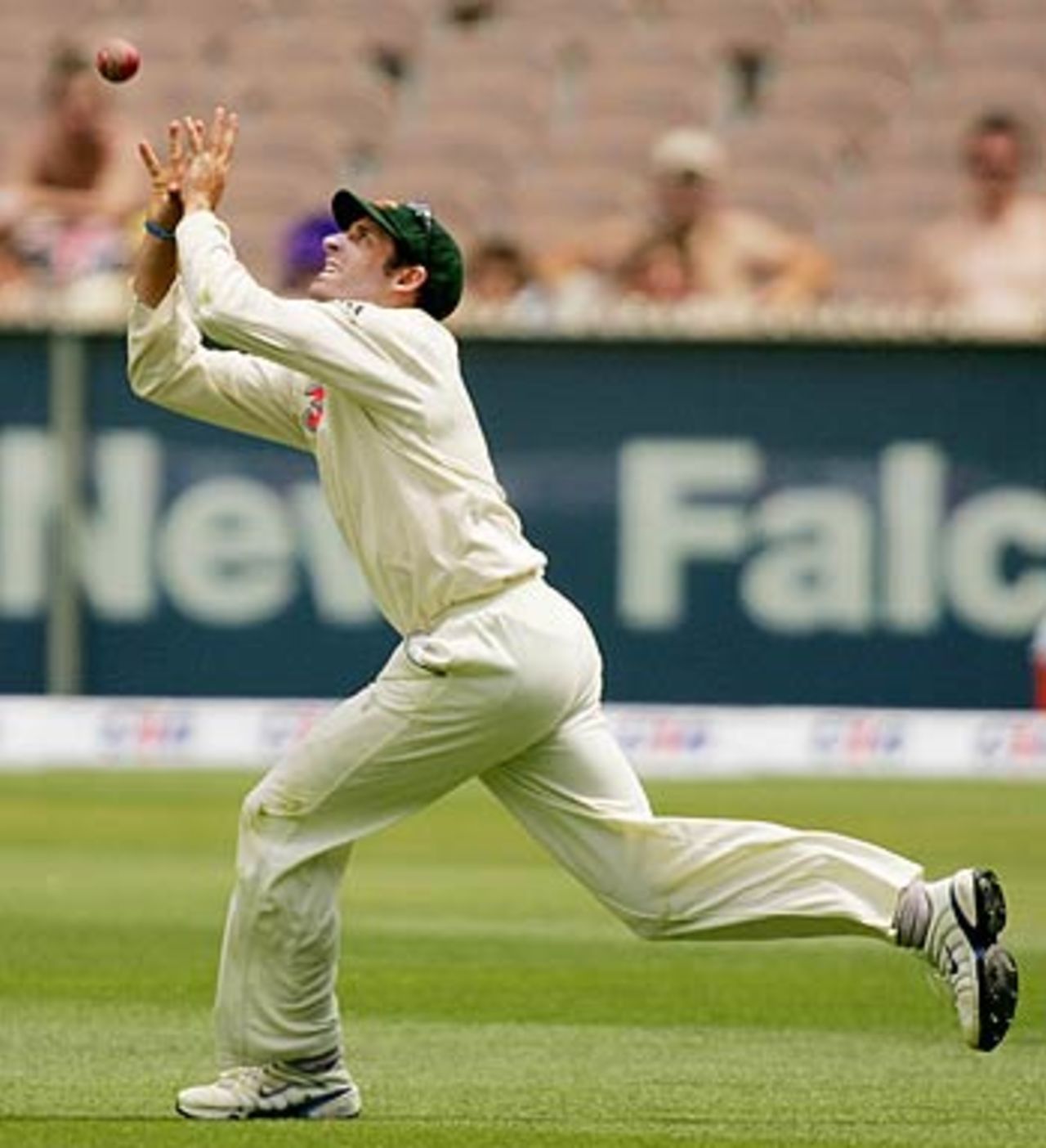 Michael Hussey pouches Andre Nel to signal the end of the South African innings, Australia v South Africa, 2nd Test, Melbourne, 3rd day, December 28, 2005