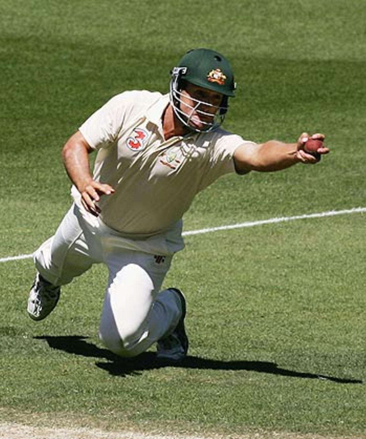 Phil Jaques pulls off an athletic stop close-in, Australia v South Africa, 2nd Test, Melbourne, 4th day, December 30, 2005