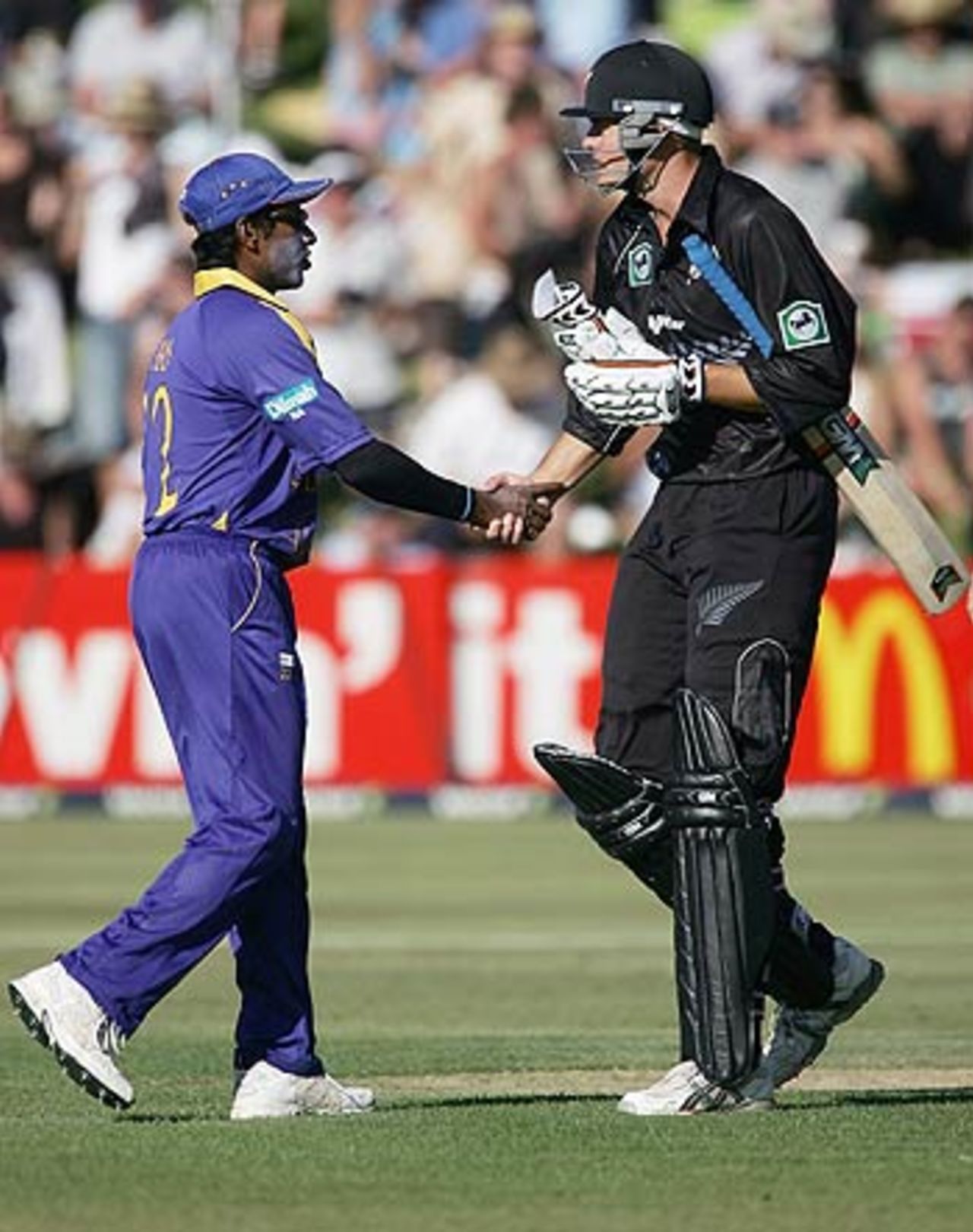 Chaminda Vaas congratulates Peter Fulton after New Zealand cruised to victory, New Zealand Sri Lanka, 1st ODI, Queenstown, December 31, 2005