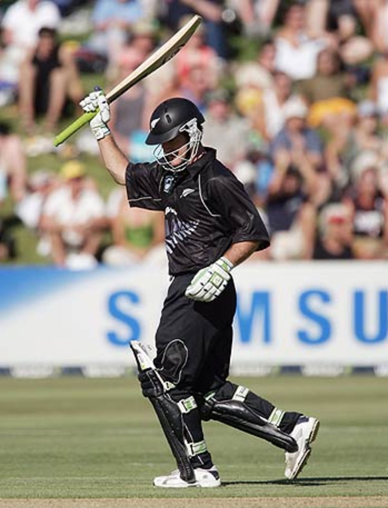  Jamie How raises his bat on completing fifty on debut, New Zealand Sri Lanka, 1st ODI, Queenstown, December 31, 2005
