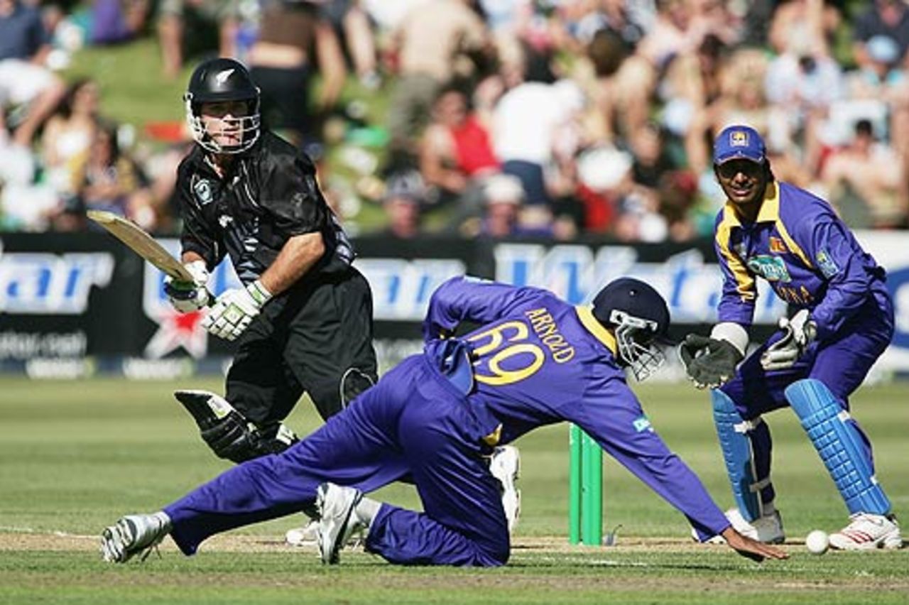  Jamie How turns one past a diving Russel Arnold, New Zealand Sri Lanka, 1st ODI, Queenstown, December 31, 2005