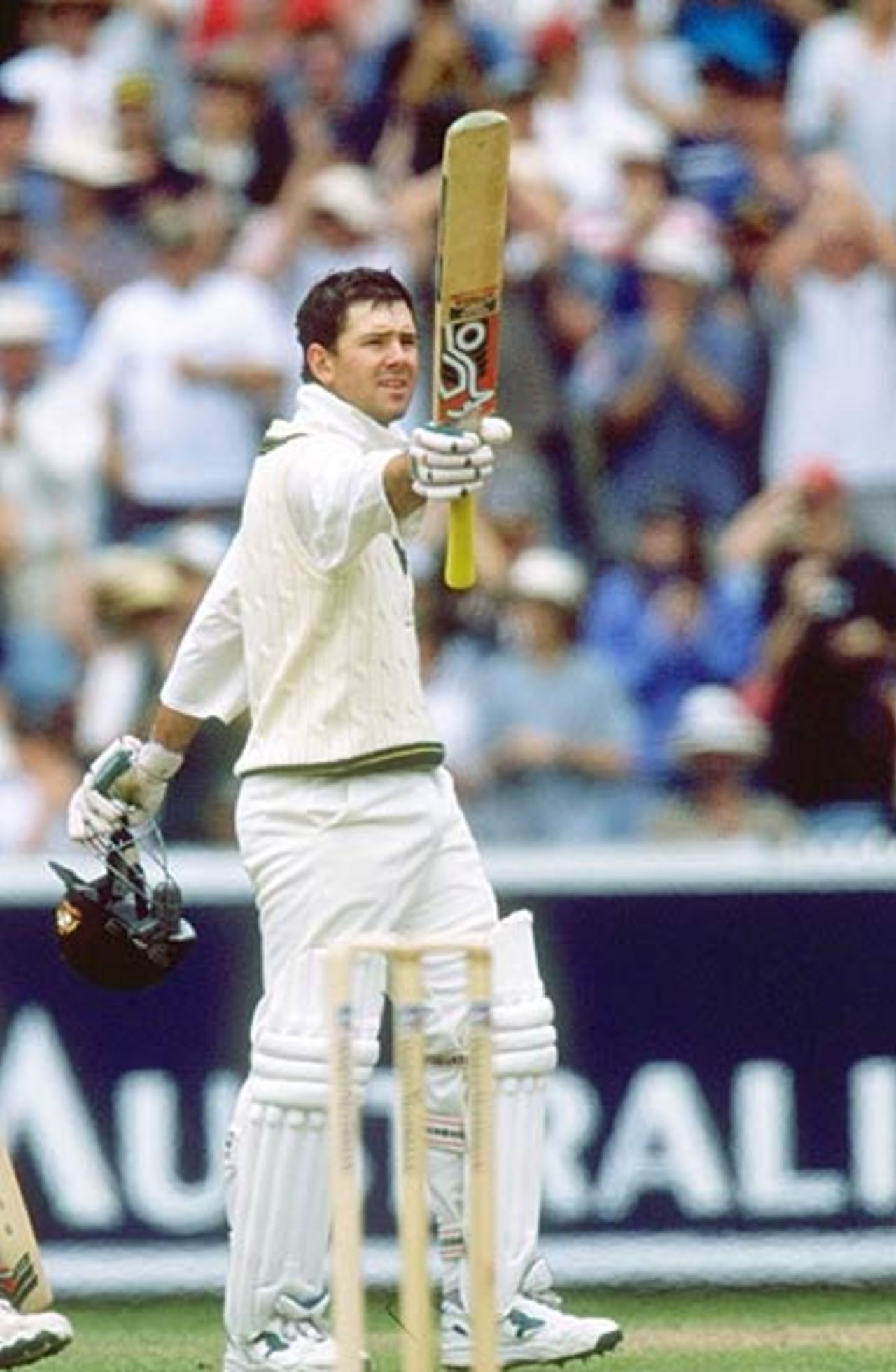 Ricky Ponting of Australia celebrates reaching his hundred during the first Test  against South Africa at the MCG in Melbourne, 1997