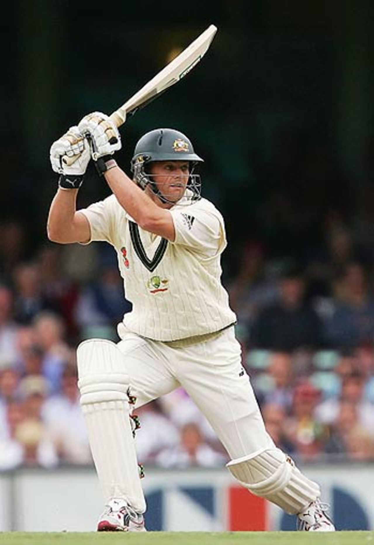 Adam Gilchrist leans into a cover drive, Australia v South Africa, 3rd Test, Sydney, 3rd day, January 4, 2006