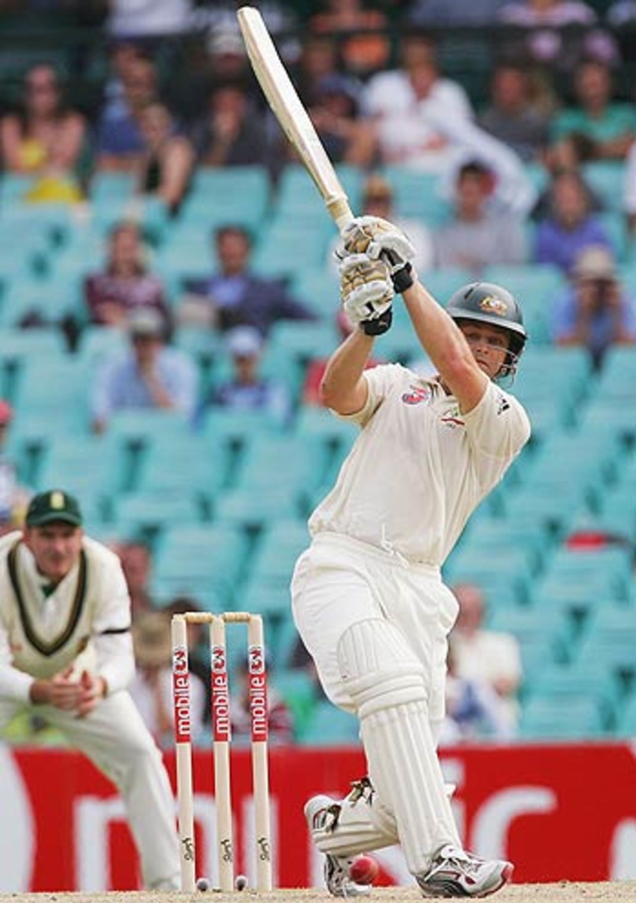 Adam Gilchrist smashes one past mid on, Australia v South Africa, 3rd Test, Sydney, 3rd day, January 4, 2006