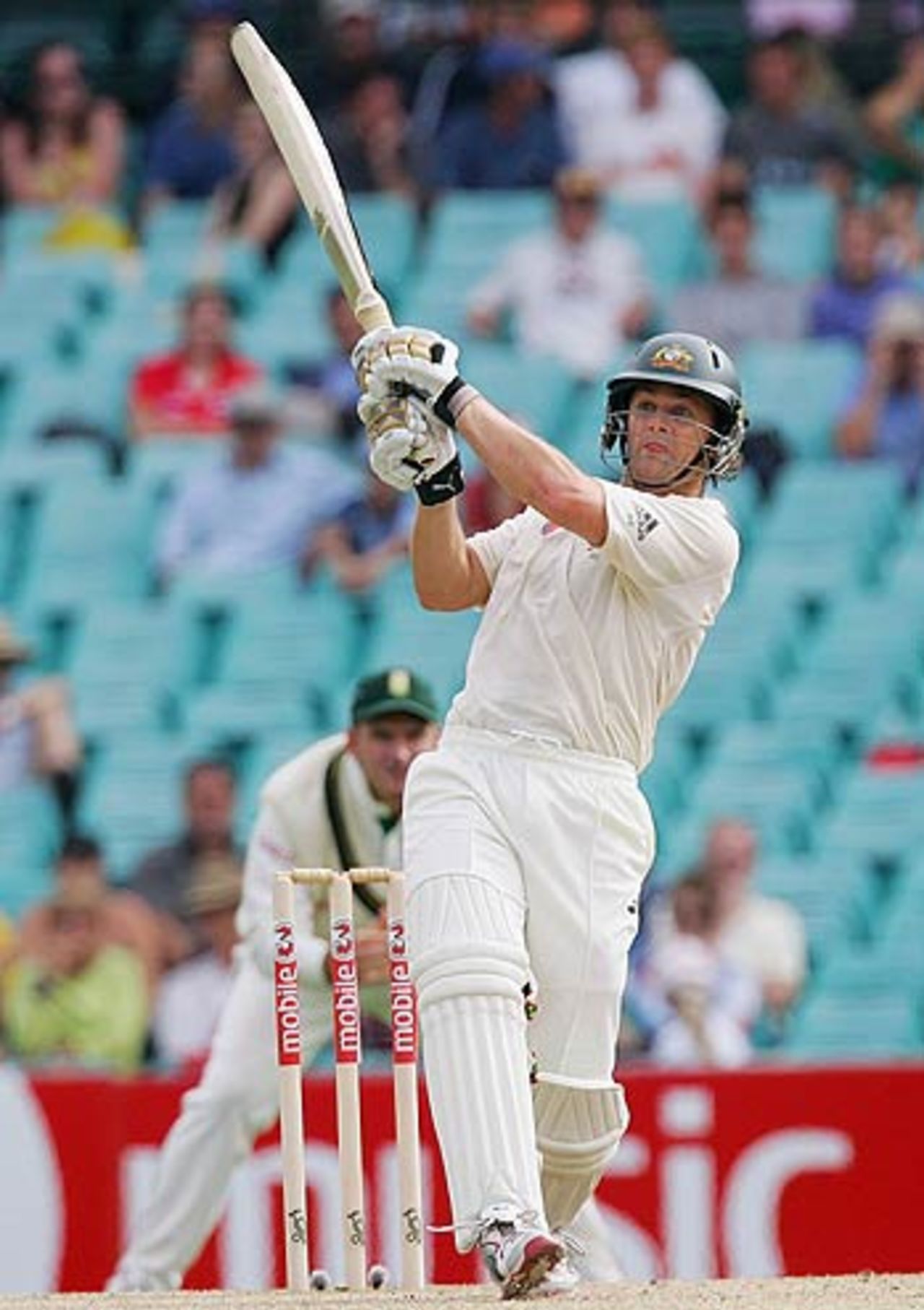 Adam Gilchrist lofts over midwicket during his half-century, Australia v South Africa, 3rd Test, Sydney, 3rd day, January 4, 2006
