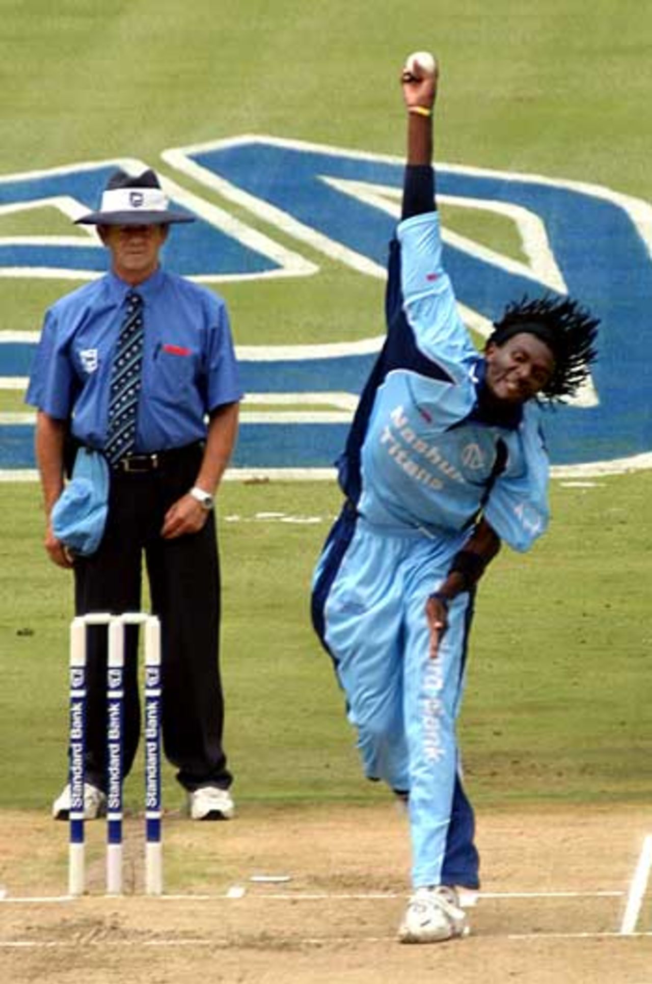 Ethy Mbhalati lets the ball, and his hair, fly, Titans v Dolphins, 2nd Semi Final Standard Bank Cup, Centurion, January 8, 2005
