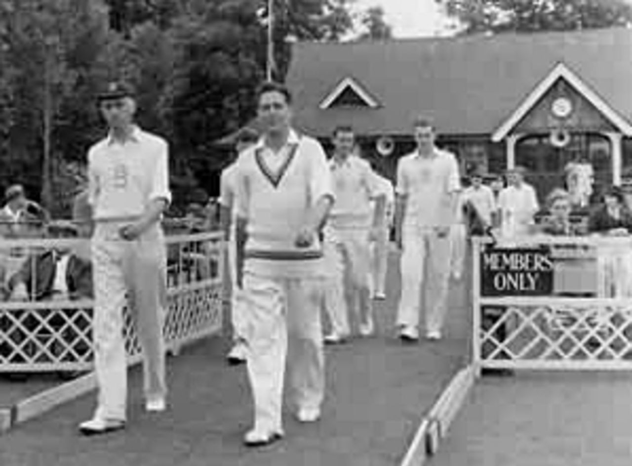 Trevor Bailey leads Essex out at Colchester in 1957