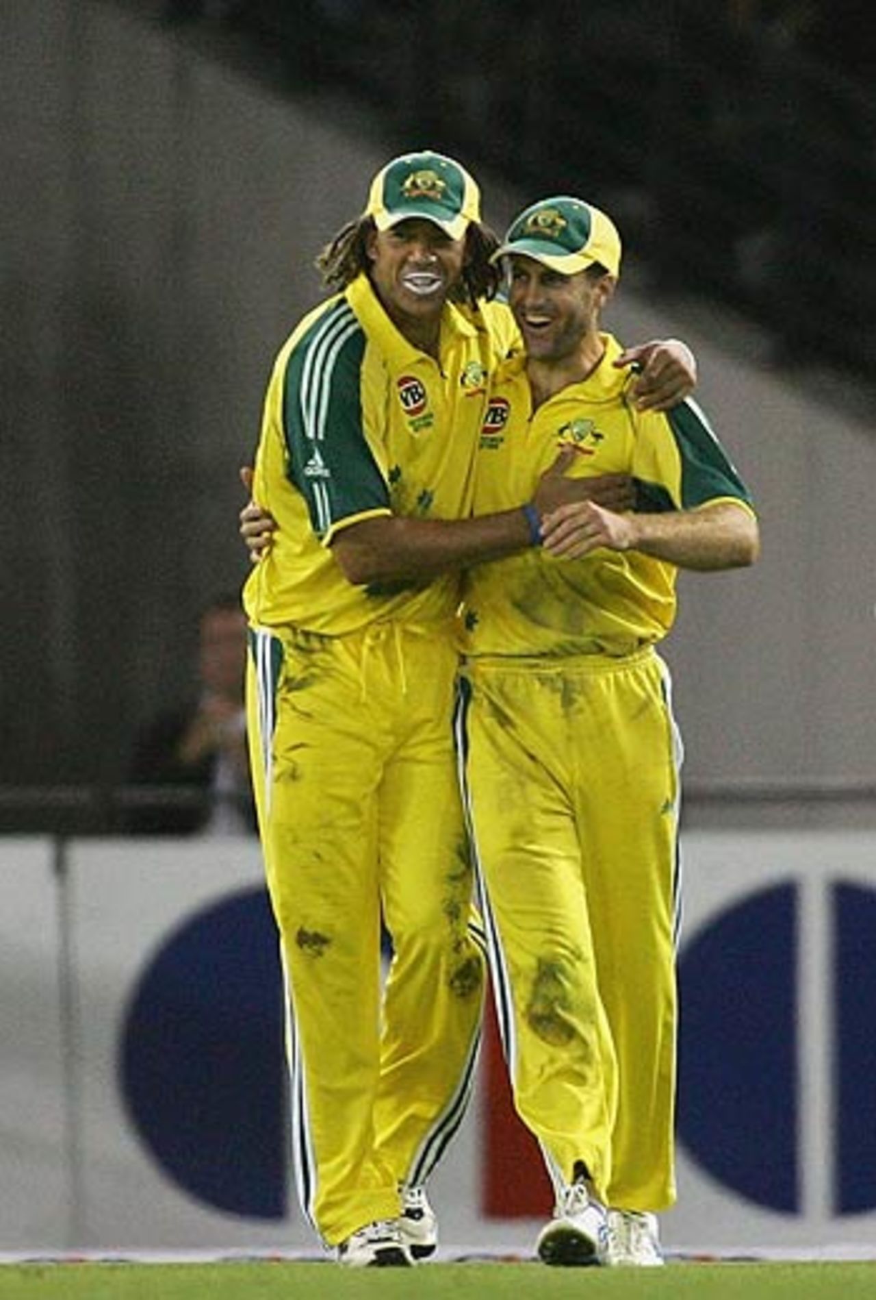 Andrew Symonds congratulates Simon Katich on his fine catch, Australia v Sri Lanka, VB Series, Docklands Stadium, Melbourne, January 13, 2006