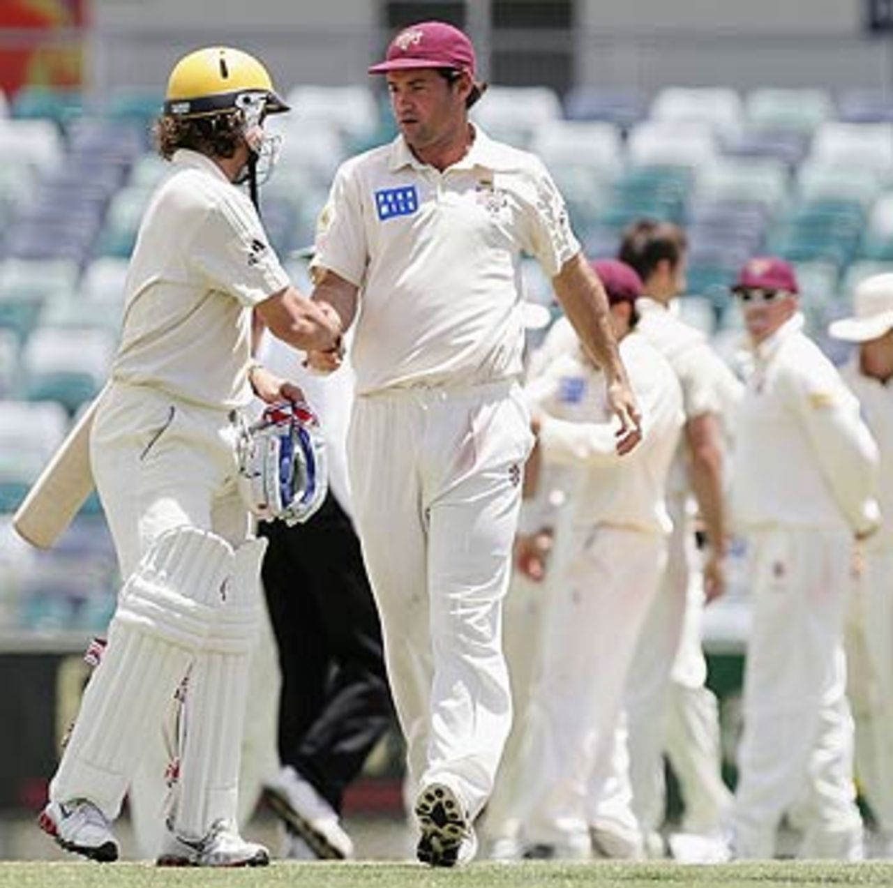 Jimmy Maher gives a noble farewell to Ryan Campbell after the latter's dismissal in the second innings, Western Australia v Queensland, Pura Cup, Perth, January 18, 2006