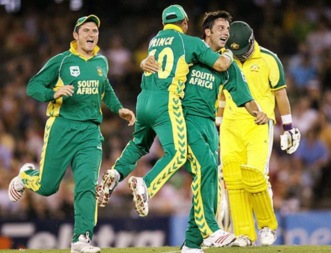 Johannes van der Wath celebrates with his team-mates after dismissing Phil Jaques , Australia v South Africa, VB Series, Telstra Dome, Melbourne, January 20, 2006