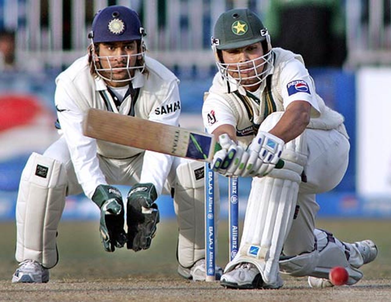 Kamran Akmal plays a sweep shot during his undefeated innings of 59, Pakistan v India, 2nd Test, 4th day, Faisalabad, January 24 2006