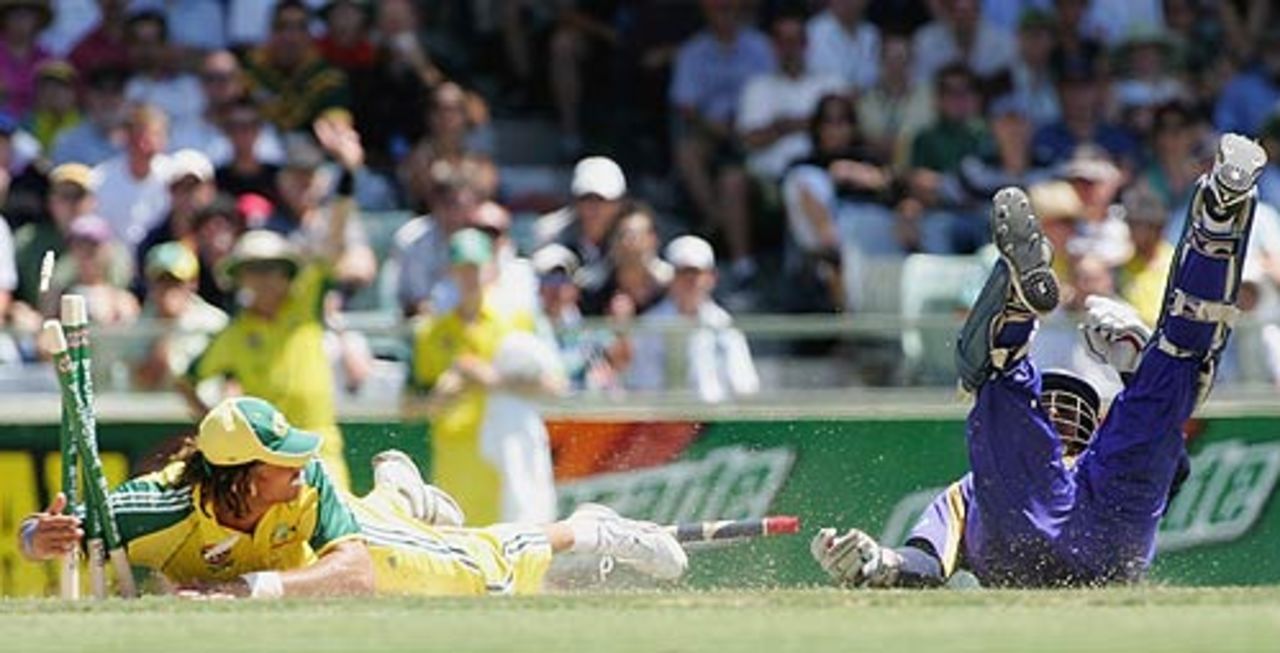 Andrew Symonds slides to run out Kumar Sangakkara , Australia v Sri Lanka, 8th Match, VB Series, Perth, January 29, 2006