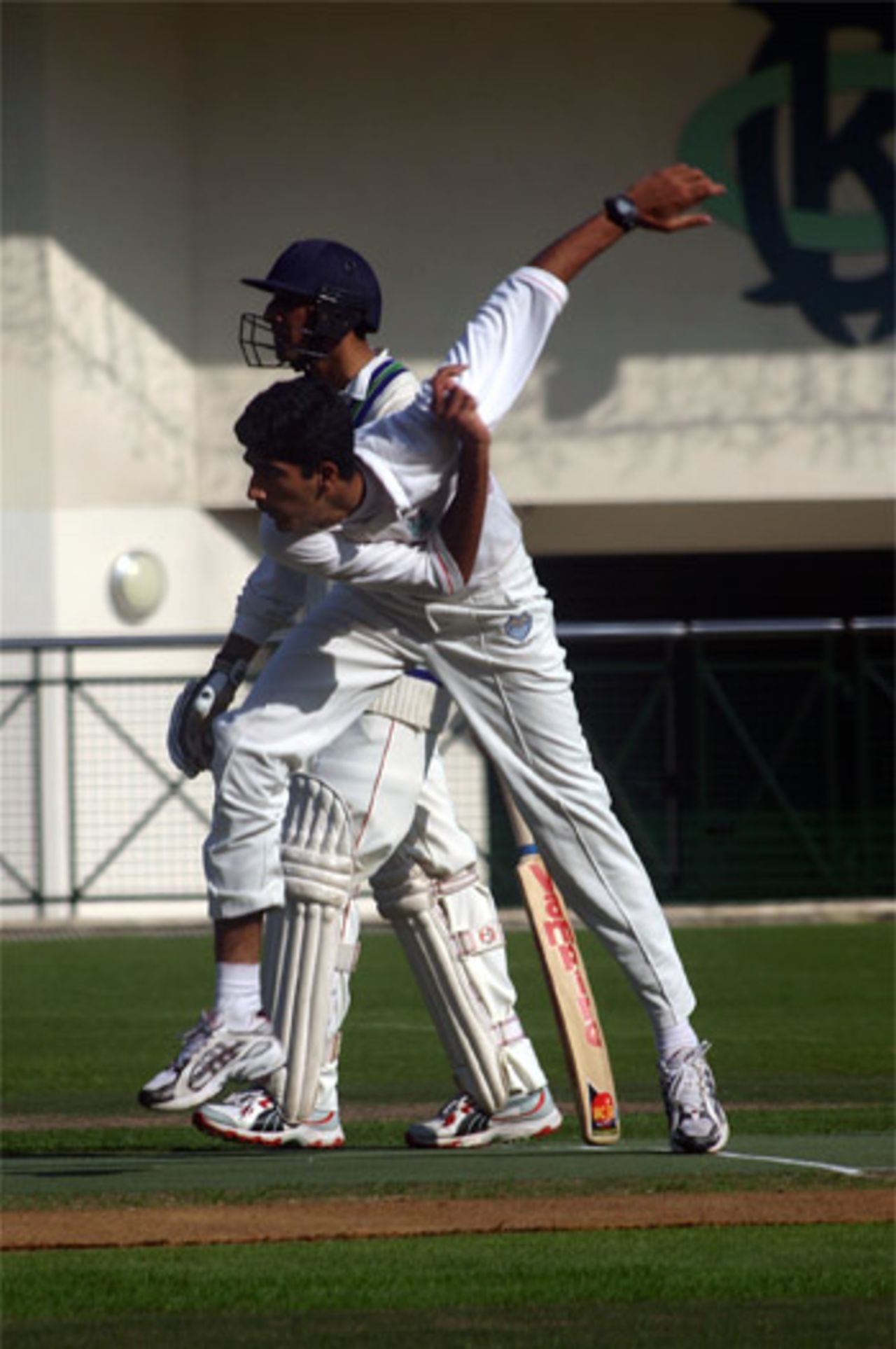 Khuram Shahzad bowling in a Twenty20 match at KCC