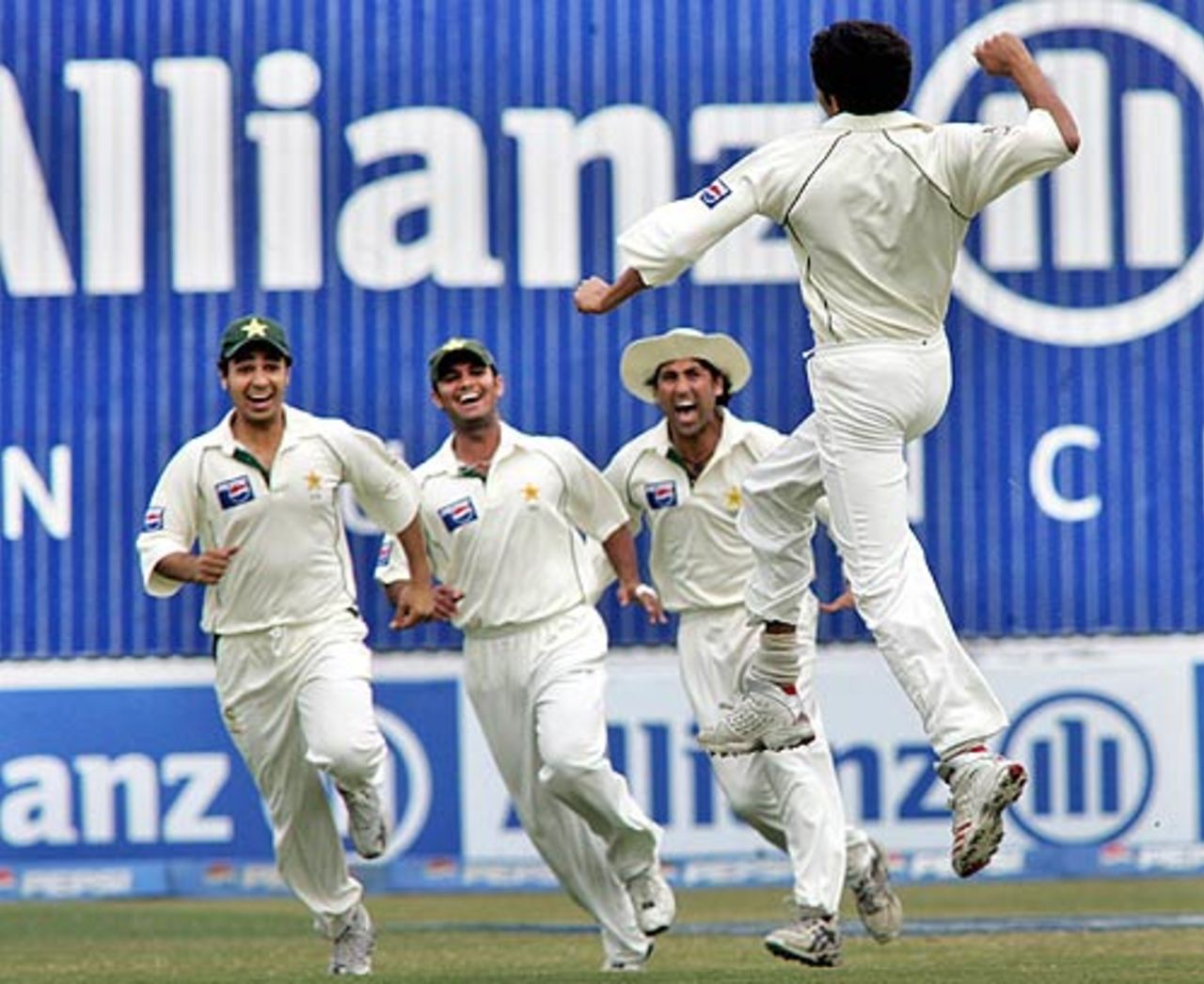 Celebration time for Mohammad Asif and Pakistan, Pakistan v India, 3rd Test, 4th day, Karachi, February 1,2006