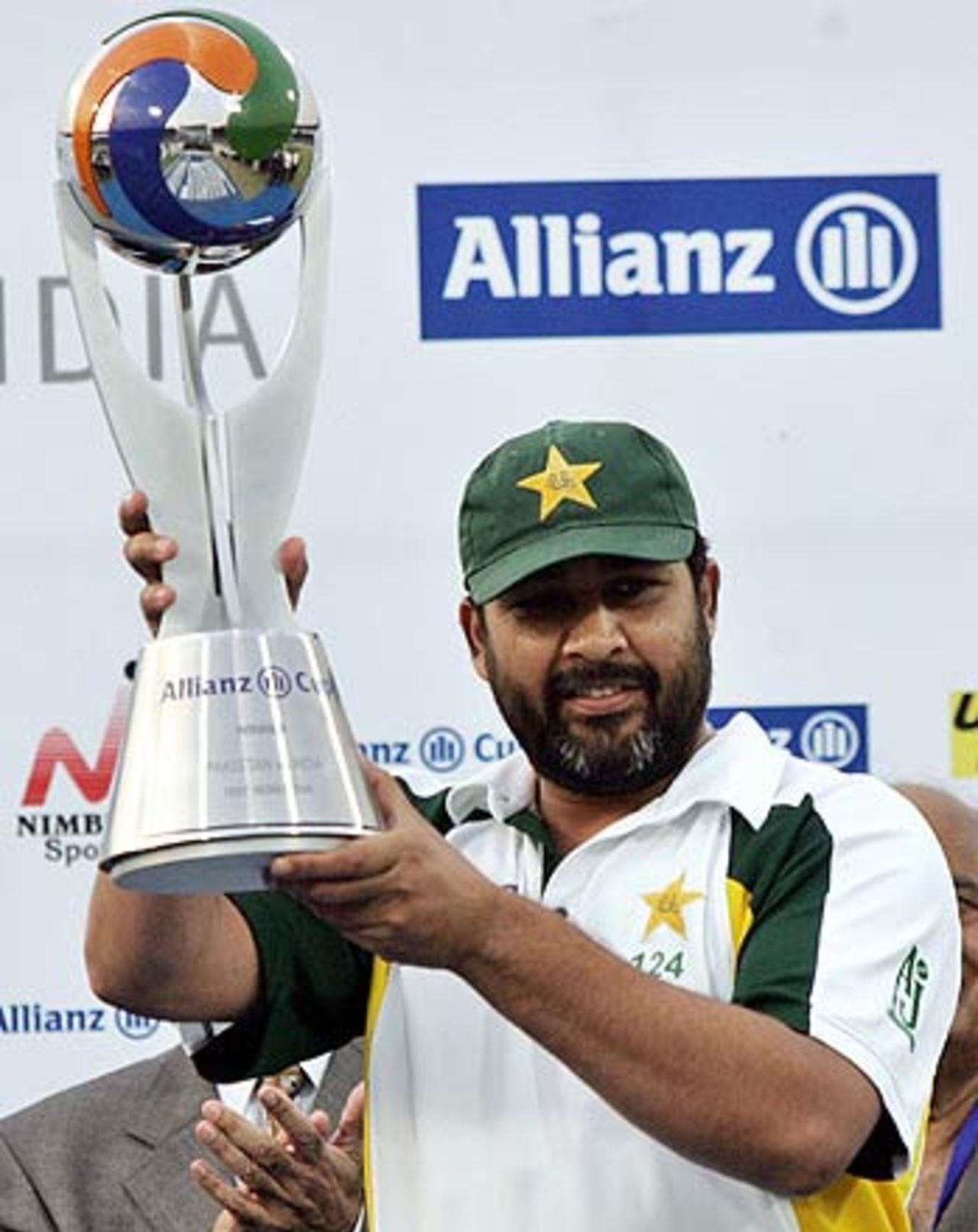 Inzamam-ul-Haq proudly holds the winner's trophy after wrapping the series 1-0, Pakistan v India, 3rd Test, 4th day, Karachi, February 1 2006