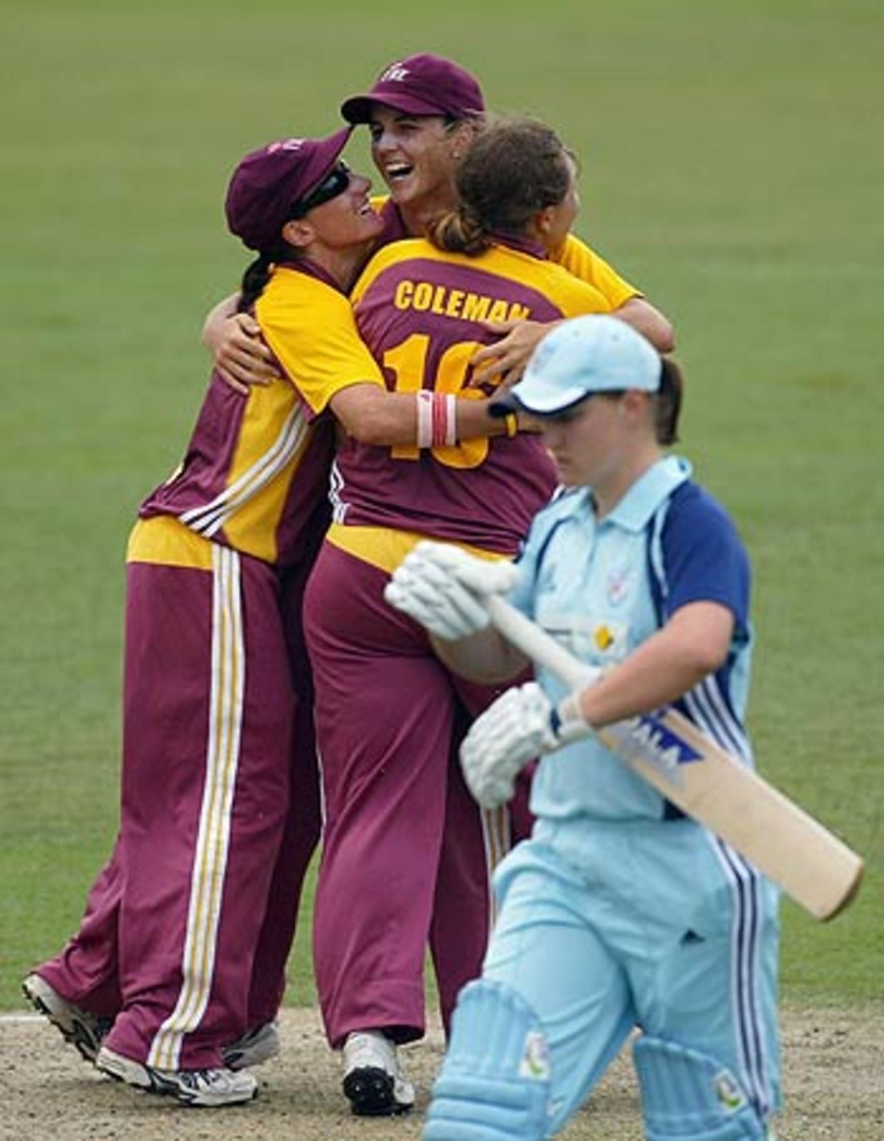 Queensland Fire cricketers celebrate the wicket of Sarah Aley, New South Wales Women v Queensland Women, 3rd Final, Women's National Cricket League, February 5, 2006