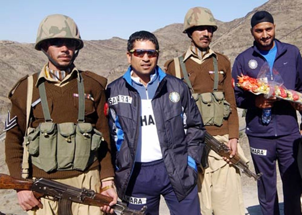 Sachin Tendulkar and Harbhajan Singh pose with Pakistani paramilitary soldiers during a visit to Michni Checkpost close to the Pak-Afghan border, Peshawar, February 4, 2006