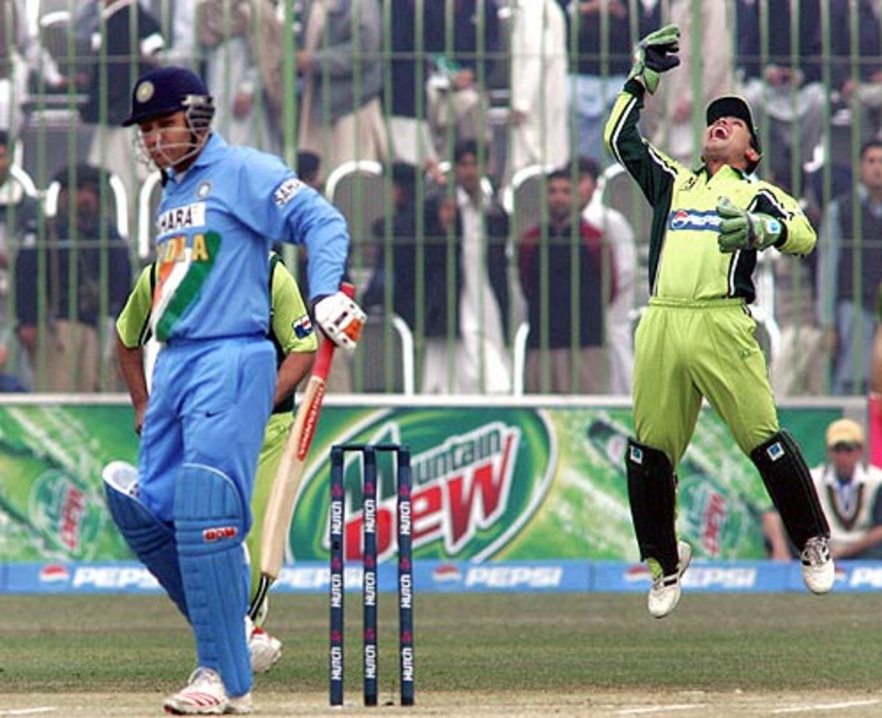 Kamran Akmal is delighted after catching Virender Sehwag, Pakistan v India, 1st ODI, Peshawar, February 6, 2006