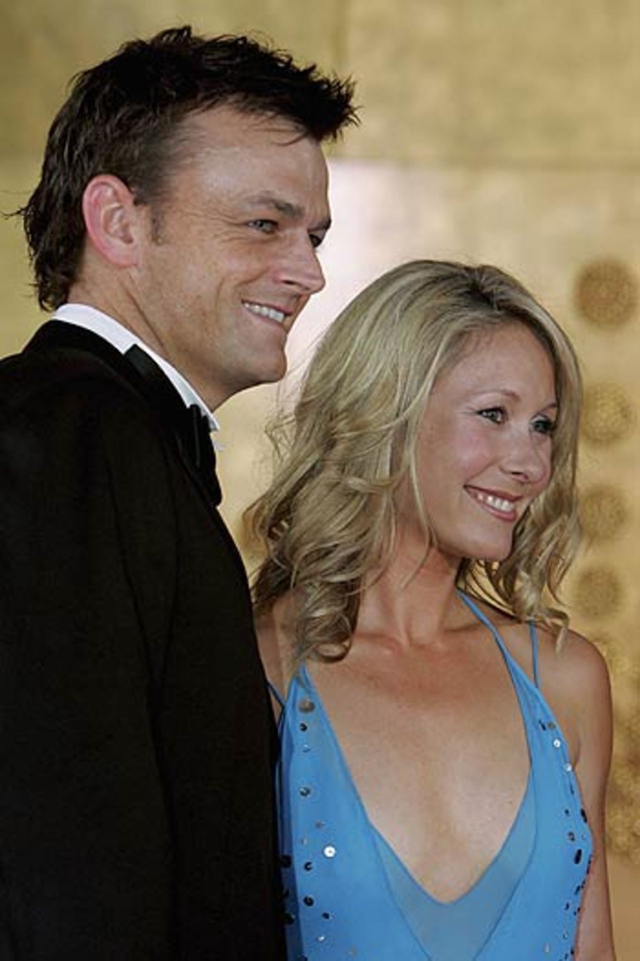 Adam Gilchrist and wife Mel pose for the cameras ahead of the Allan Border Medal Dinner, Melbourne, February 6, 2006