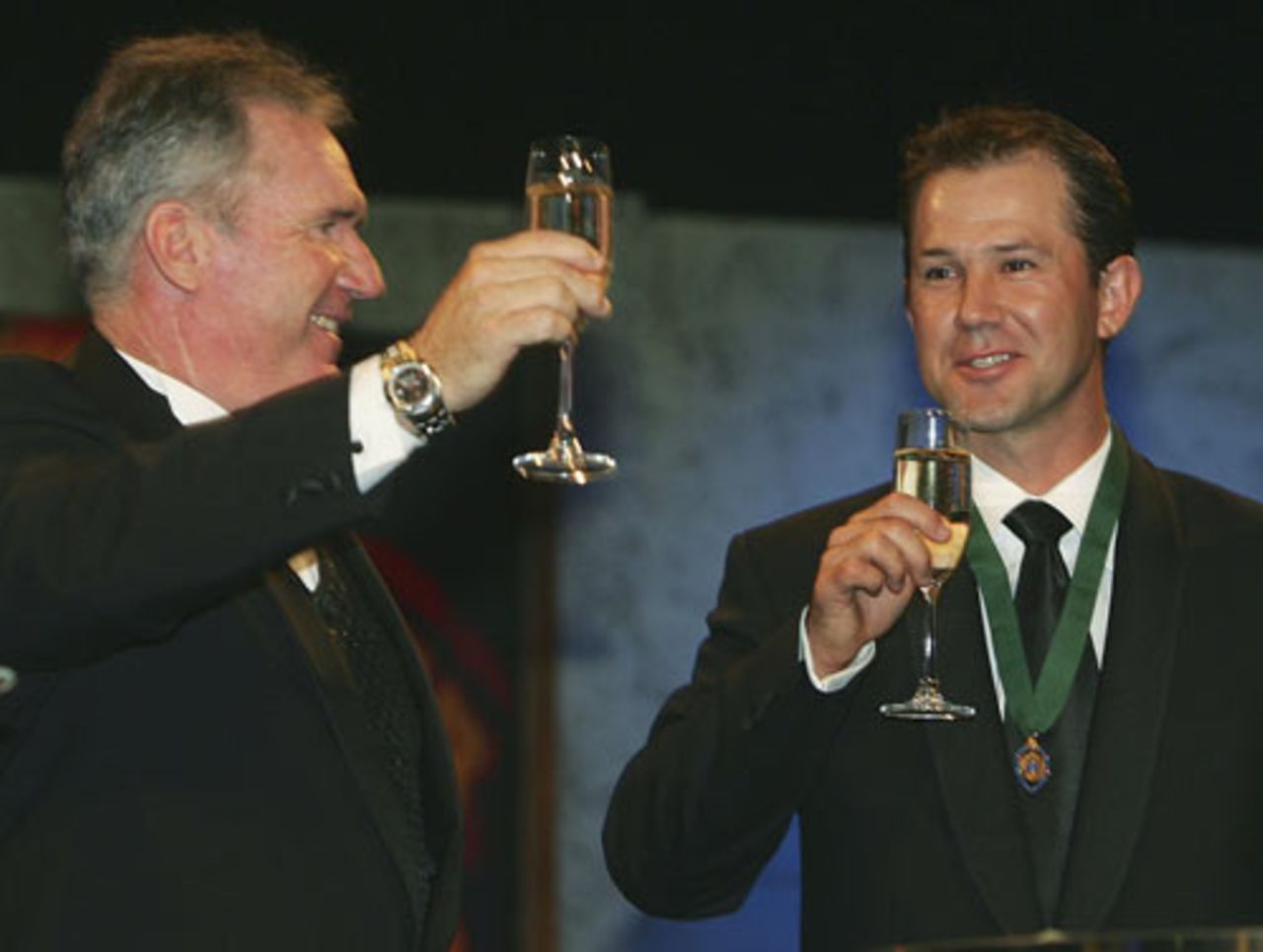 Allan Border and Ricky Ponting enjoy a toast at the awards ceremony, Melbourne, February 6, 2006