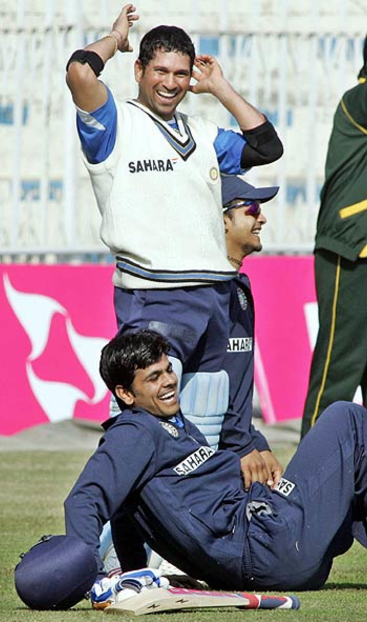 Sachin Tendulkar shares a light moment with Rudra Pratap Singh at a practice session, Rawalpindi Cricket Stadium, February 9, 2006