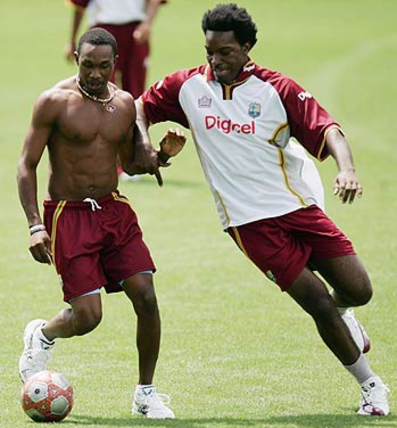 Dwayne Bravo and Chris Gayle play soccer during a practice session, Eden Park, Auckland, February 11 2006