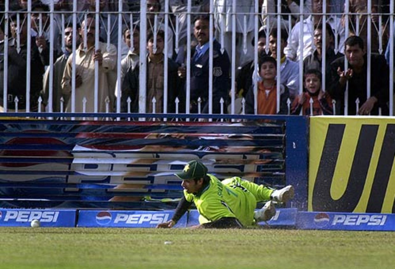 Salman Butt successfully fields the ball at the boundary as the spectators look on, Pakistan v India, 2nd ODI, Rawalpindi, February 11 2006