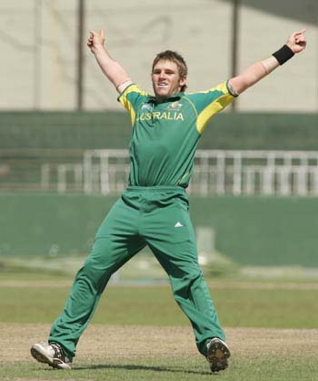 Simon Keen of Australia celebrates a wicket during his side's victory over Sri Lanka at the SSC in the Super League quarter-final of the ICC
U/19 Cricket World Cup on Saturday