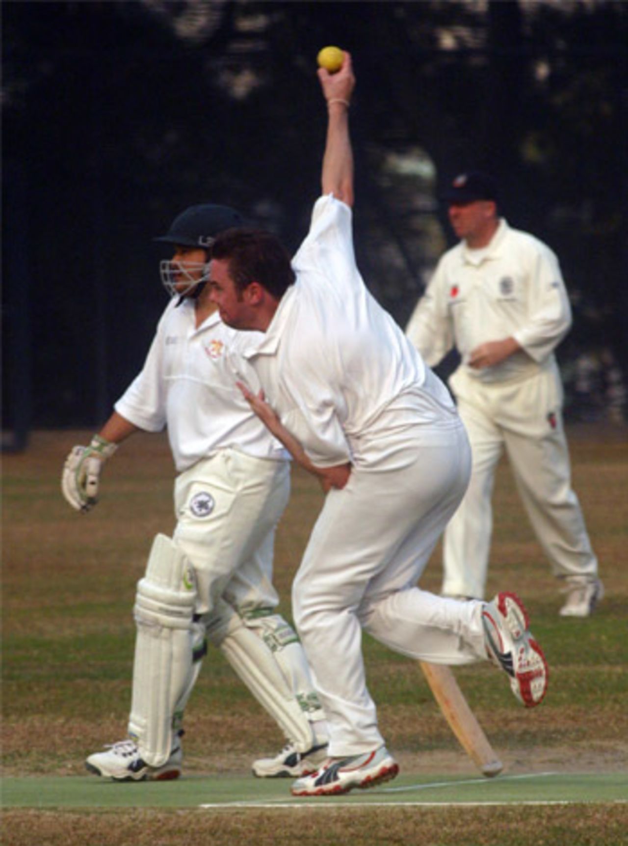 Alex Wade bowling for Gap Ramblers v. Crusaders at Mission Road on 11th February 2006
