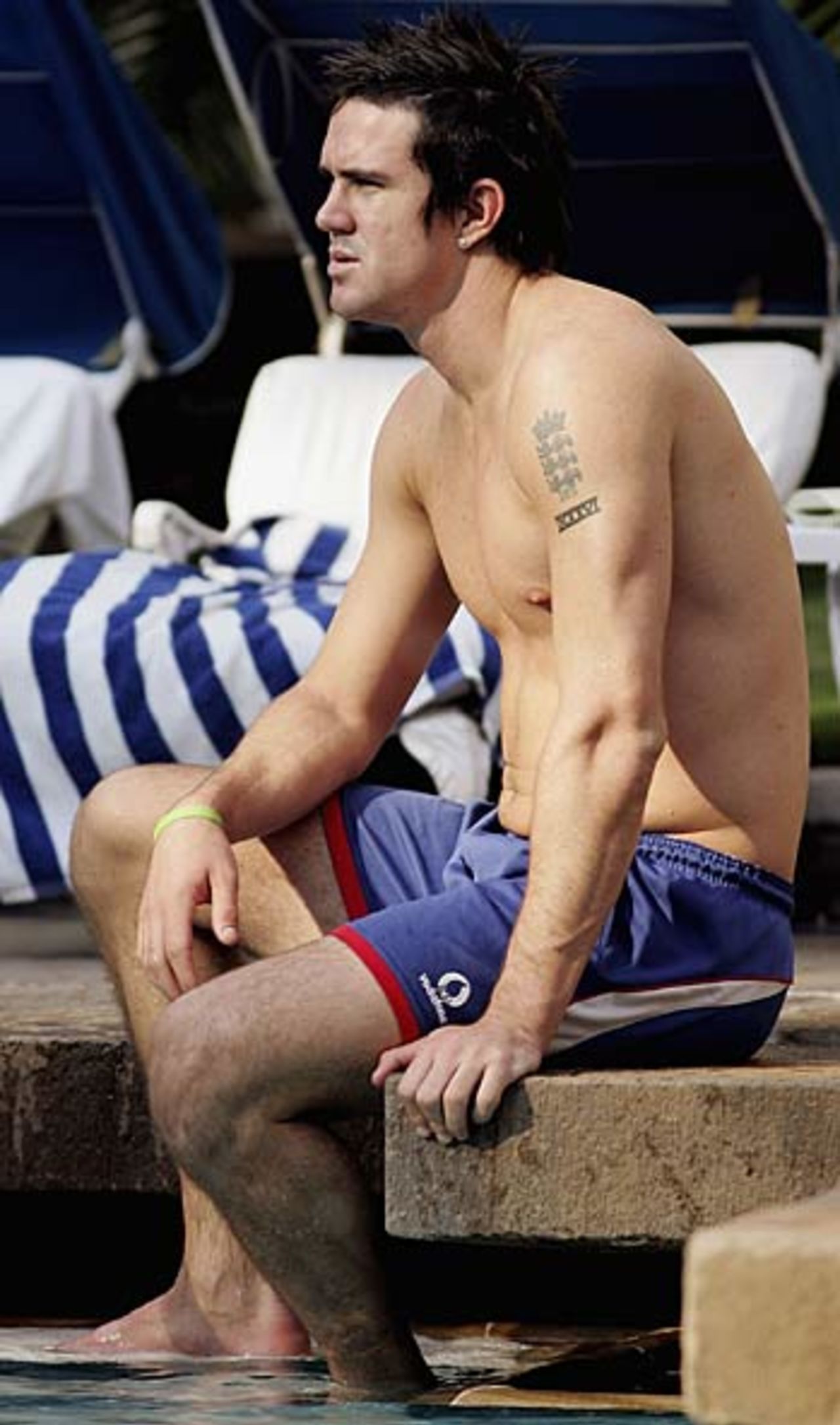 Kevin Pietersen relaxes by the pool at the Taj Mahal Palace Hotel in Mumbai, February 13, 2006