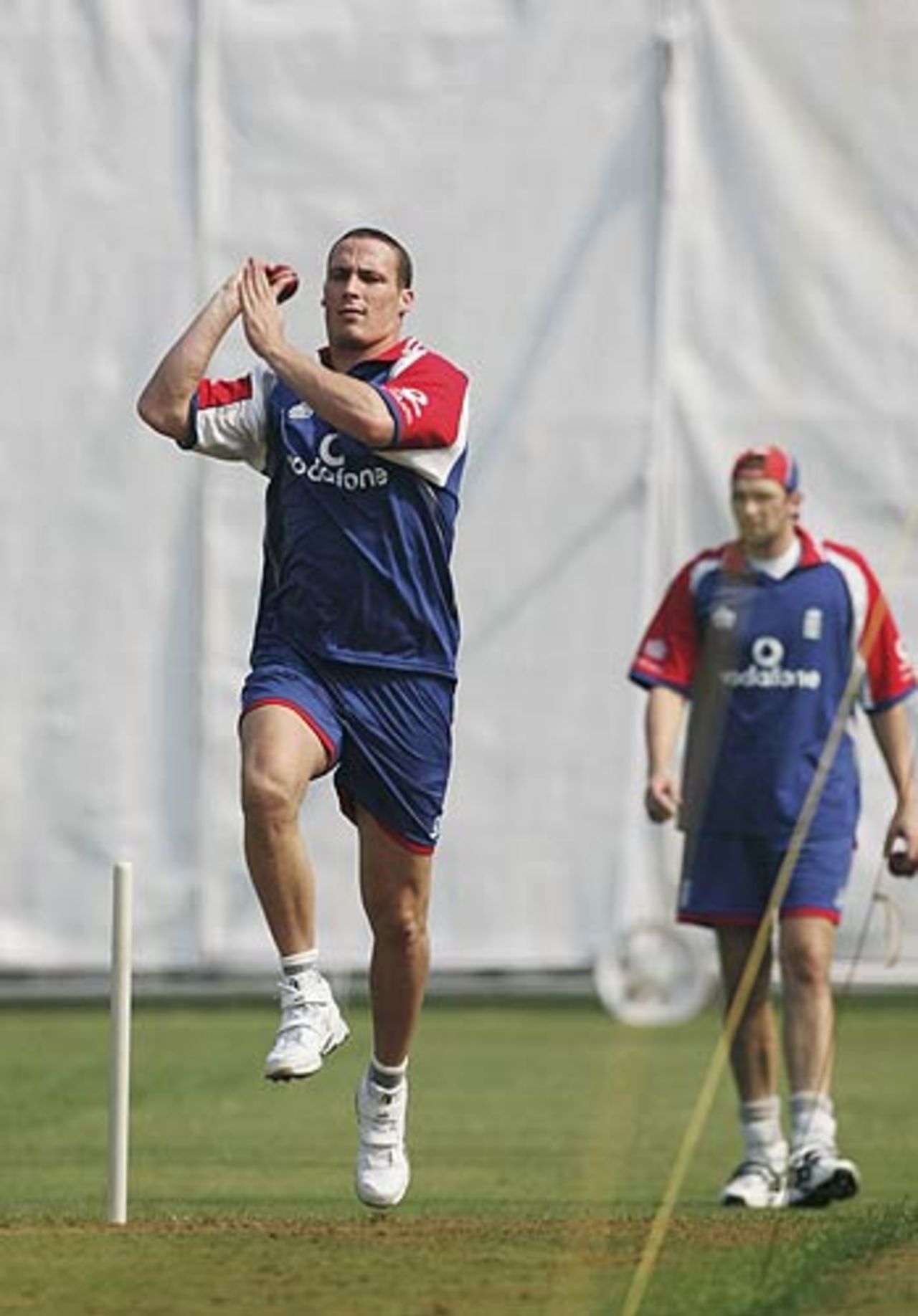 Simon Jones works on his swing as Steven Harmison looks on, Mumbai, February 15, 2006