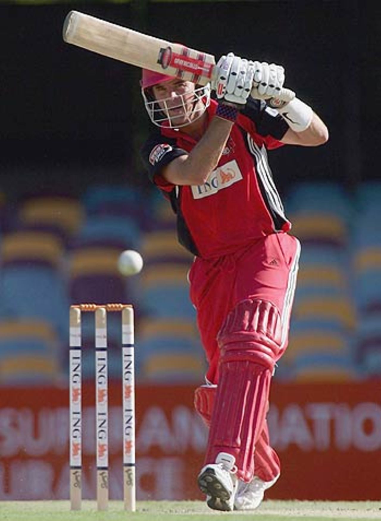 Greg Blewett drives during his attacking knock of 102, Queensland v South Australia, ING Cup, Woolloongabba, Brisbane, February 17 2006
