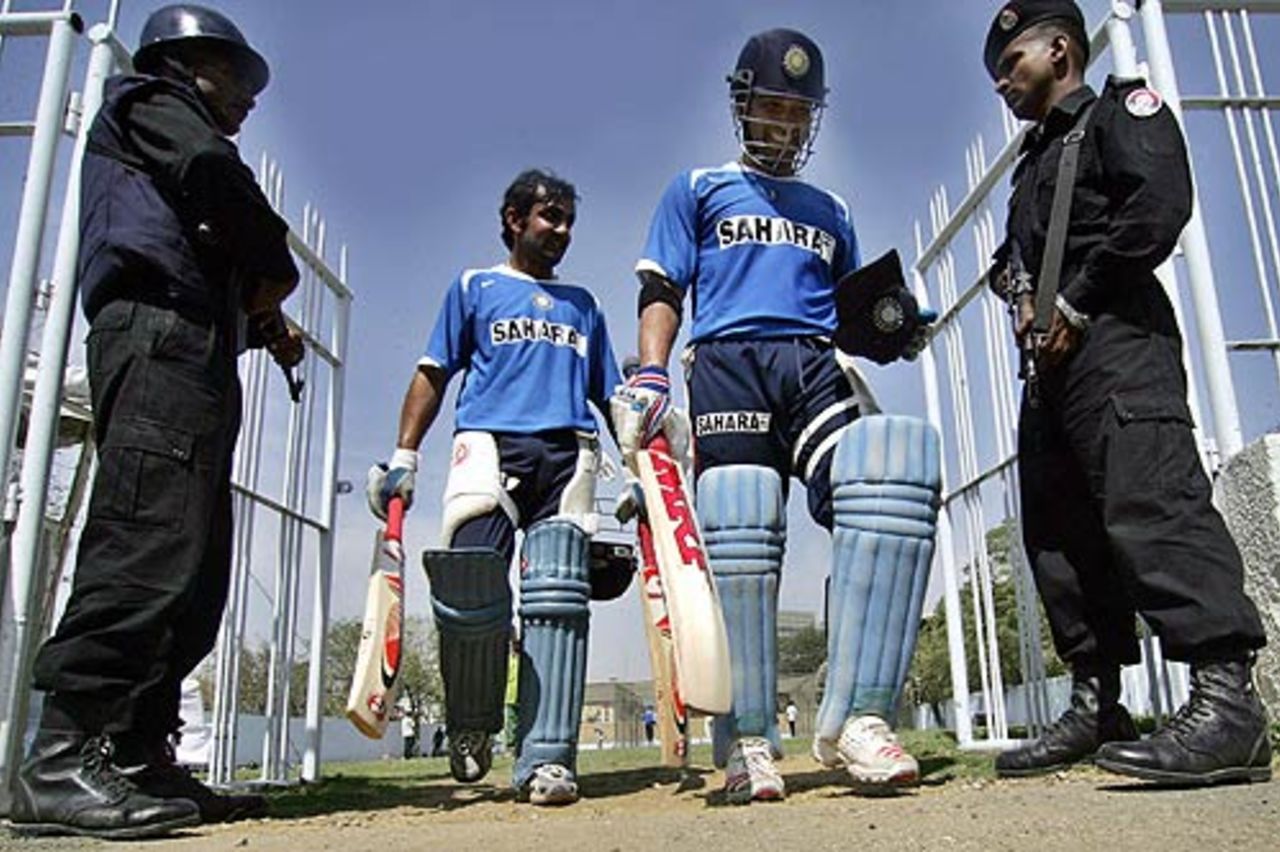 Indian players are greeted by Pakistan police commandos at a practice session, Karachi February 18 2006