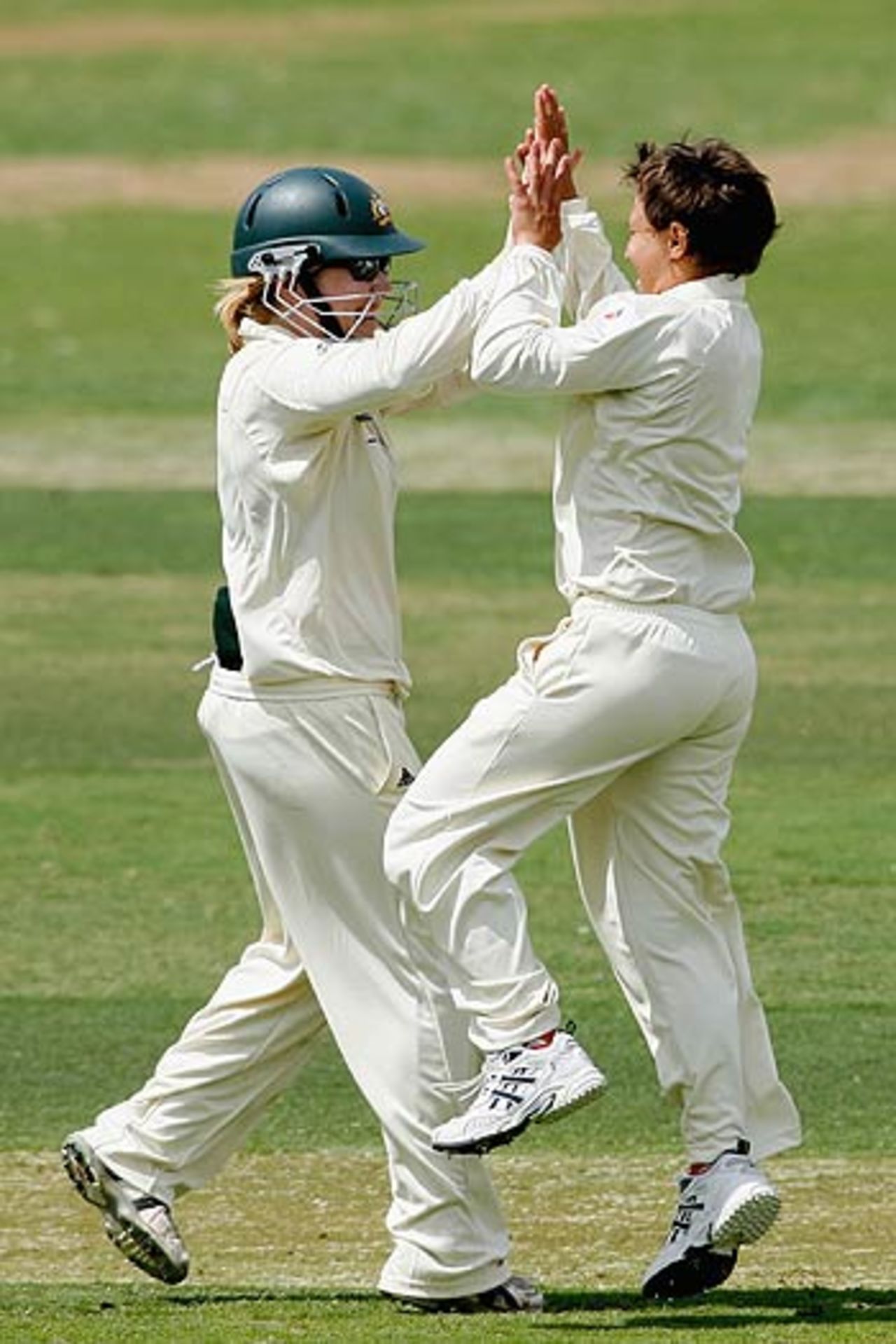 Alex Blackwell and Shelley Nitschke celebrate the fall of an Indian wicket, Australia Women v India Women, Only Test, Adelaide, Feb 19, 2006