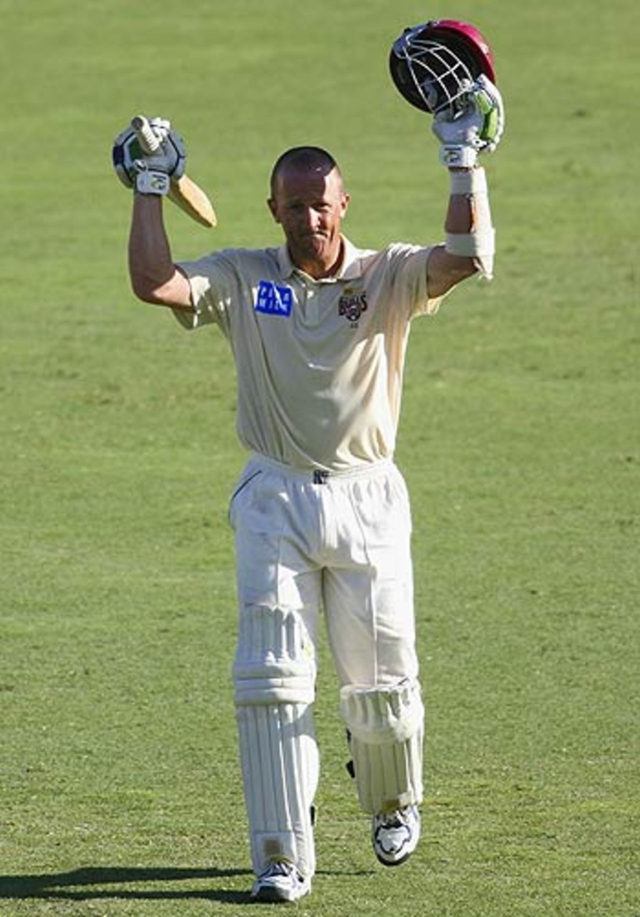 Clinton Perren celebrates his hundred on day two, Queensland v South Australia, Pura Cup, Brisbane, February 20, 2006