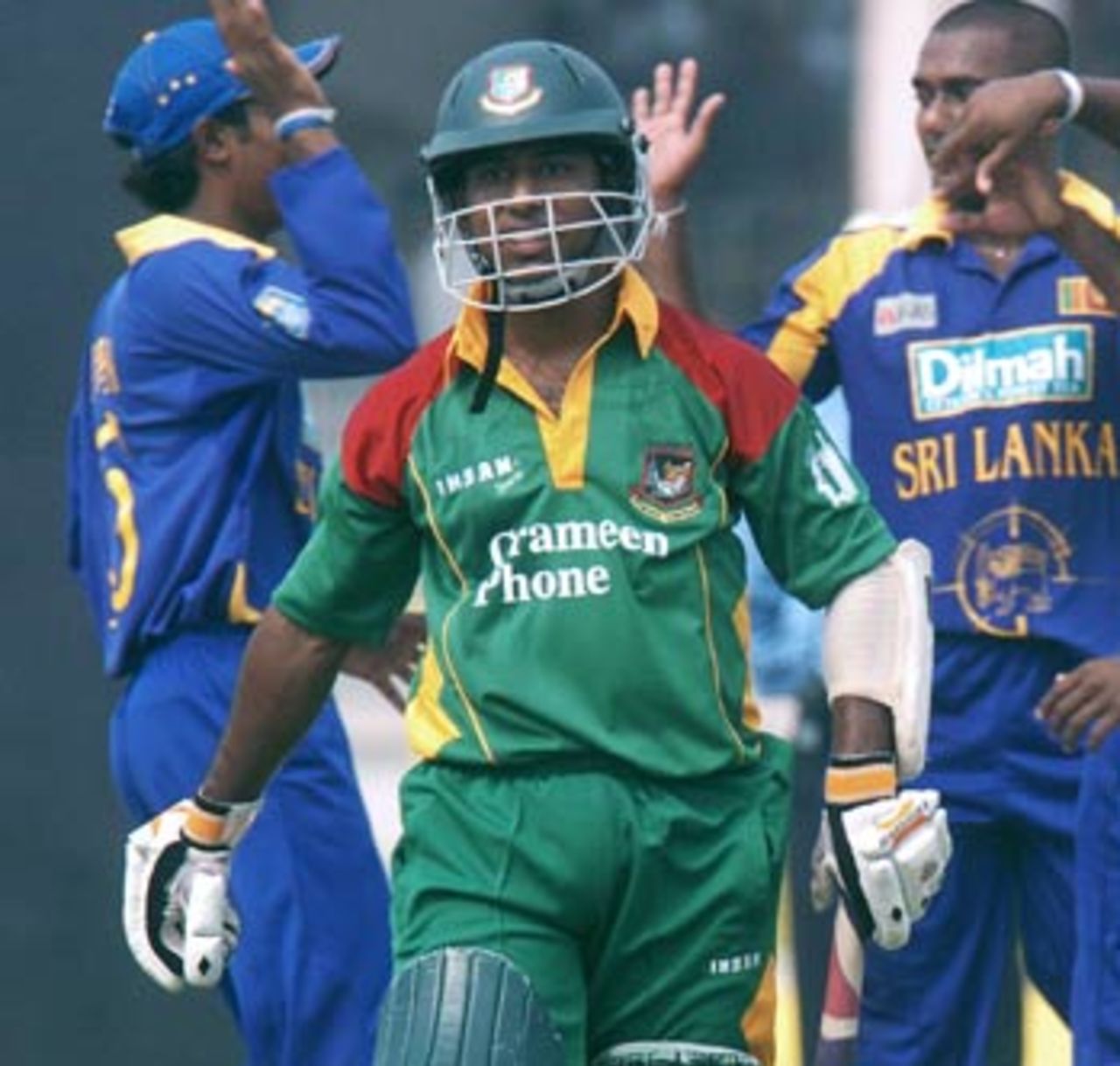 Aftab Ahmed trudges back after being dismissed for 21, Bangladesh v Sri Lanka, 1st ODI, Bogra, February 20, 2006 