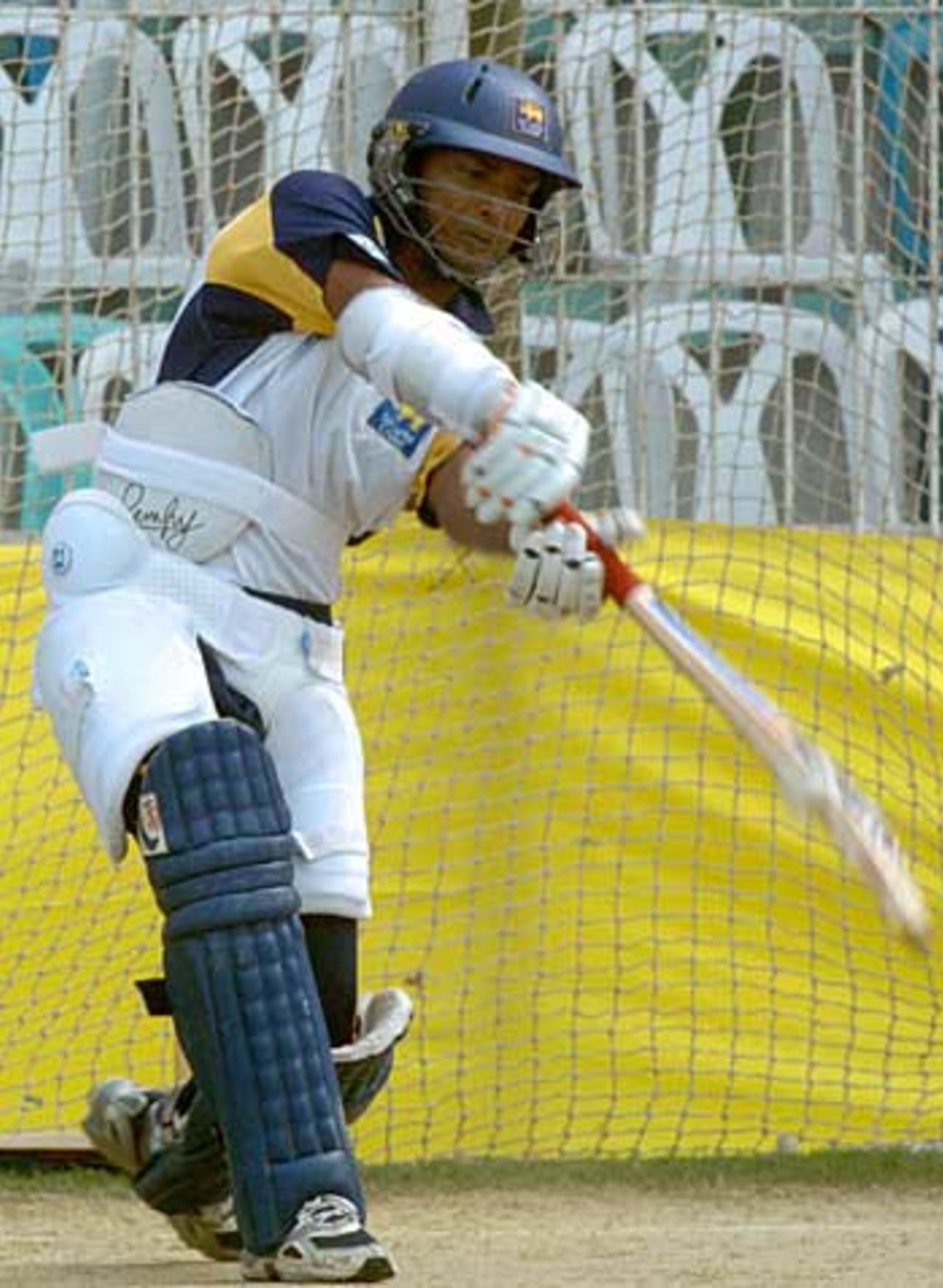 Kumar Sangakkara launches into a drive in the nets, Sri Lanka in Bangladesh, Bogra, February 21, 2006
