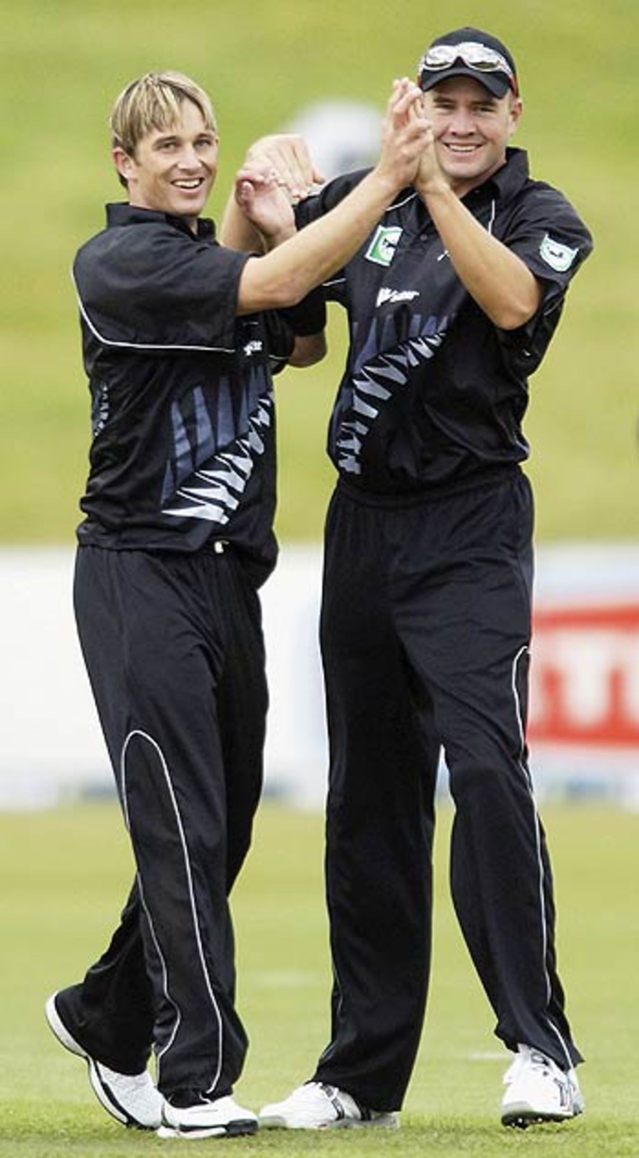 Shane Bond and Peter Fulton celebrate the dismissal of Chris Gayle,
New Zealand v West Indies, 2nd ODI, Queenstown, February 22 2006