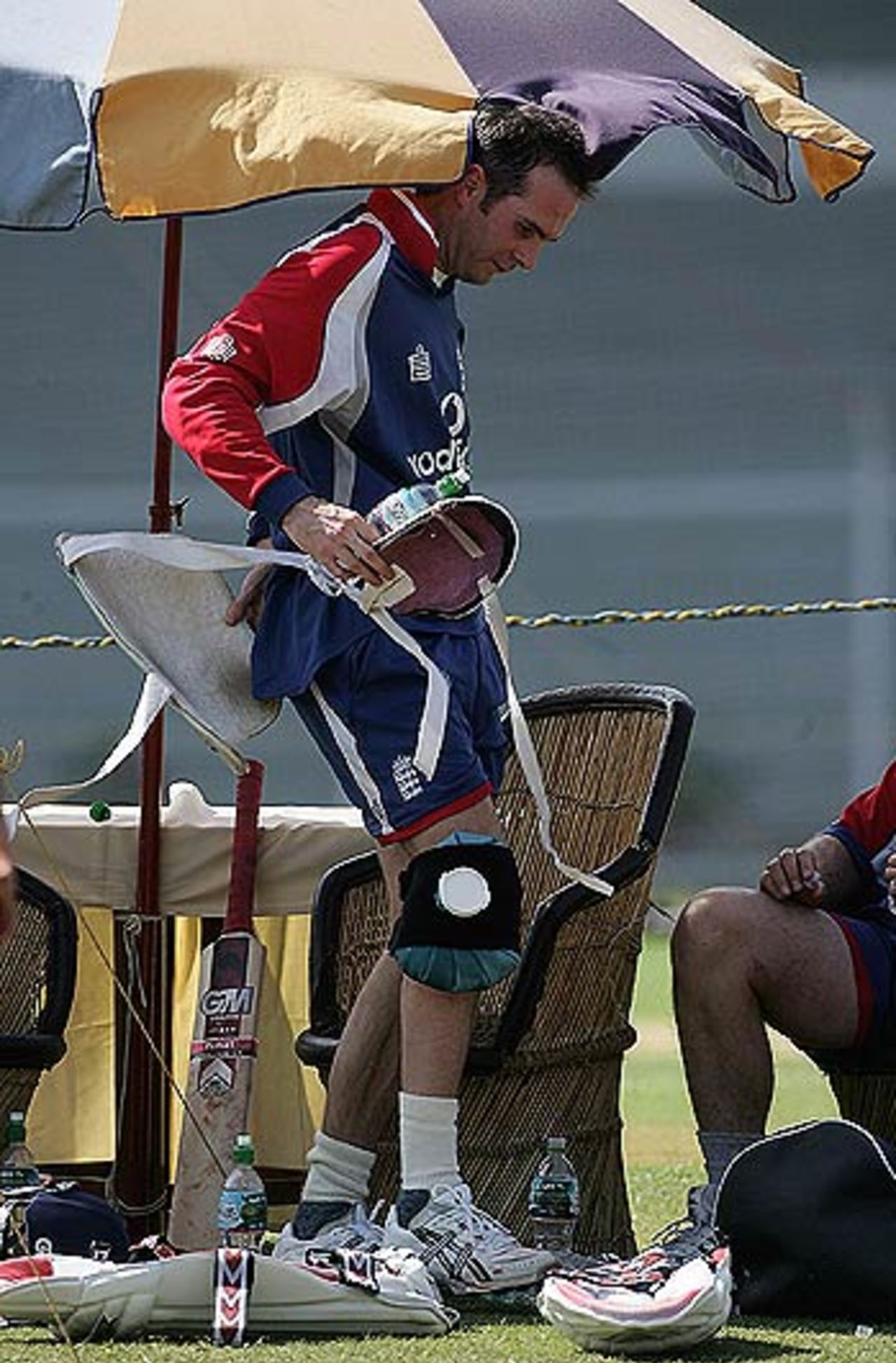 Michael Vaughan puts an ice pack on his knee, Mumbai, February 16, 2006