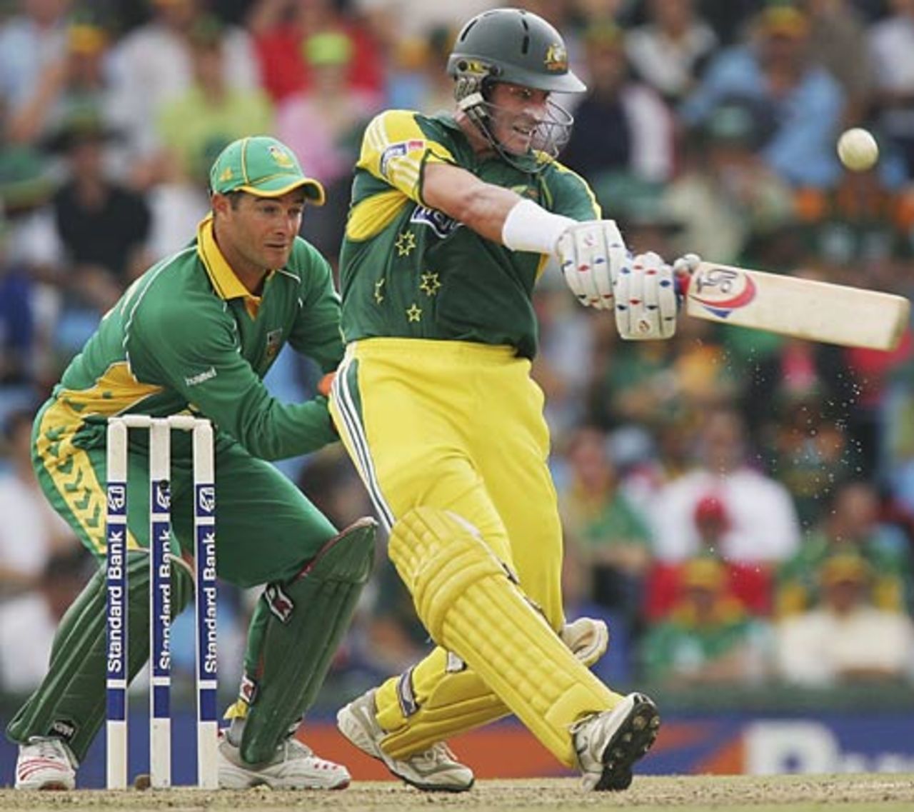 Mike Hussey powers into a pull during his 56 which guided Australia out of early trouble, South Africa v Australia, 1st ODI, Centurion Park, February 26, 2006