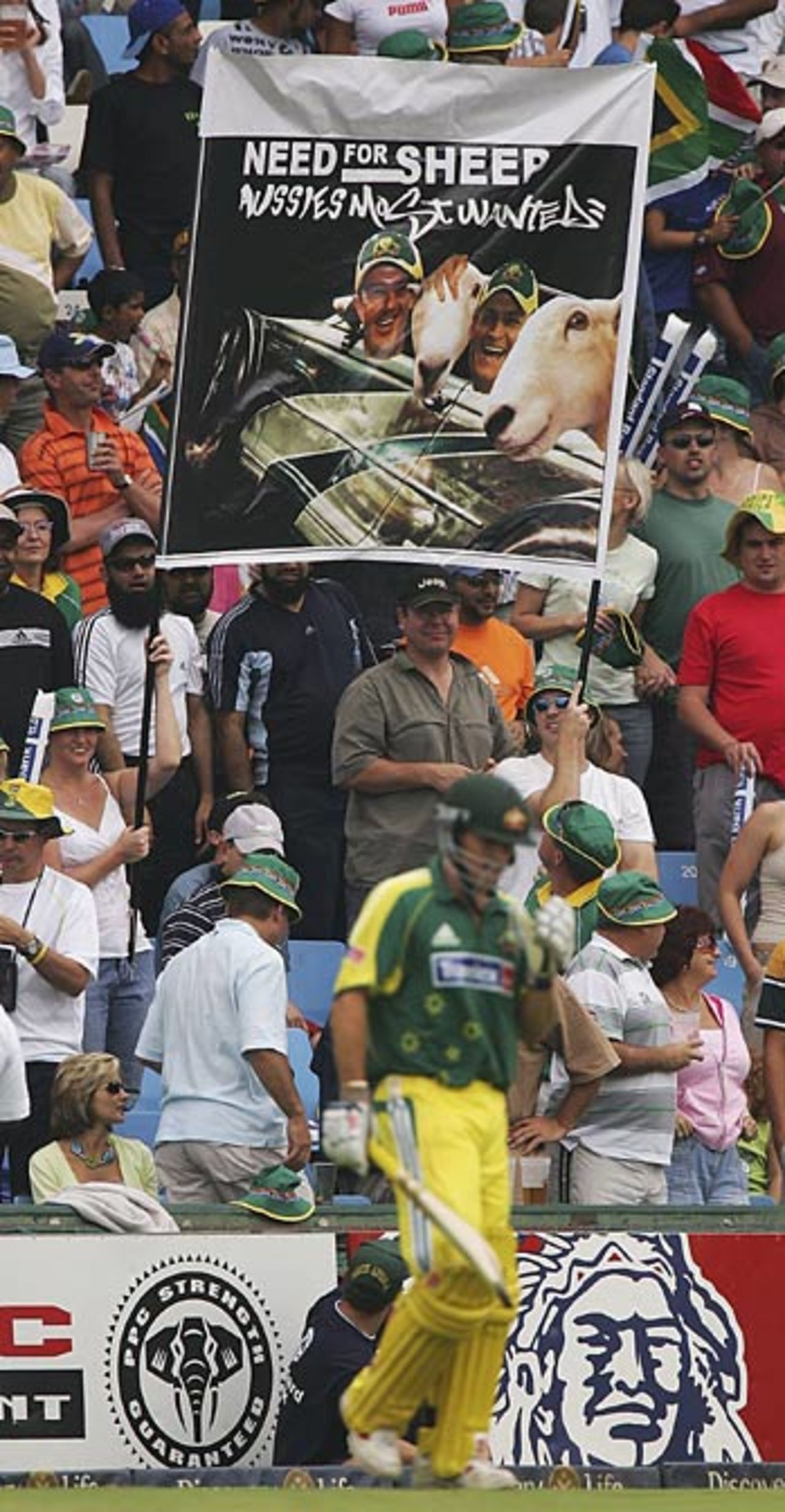 Brad Hogg is welcomed to the crease by a friendly banner, South Africa v Australia, 1st ODI, Centurion Park, February 26, 2006