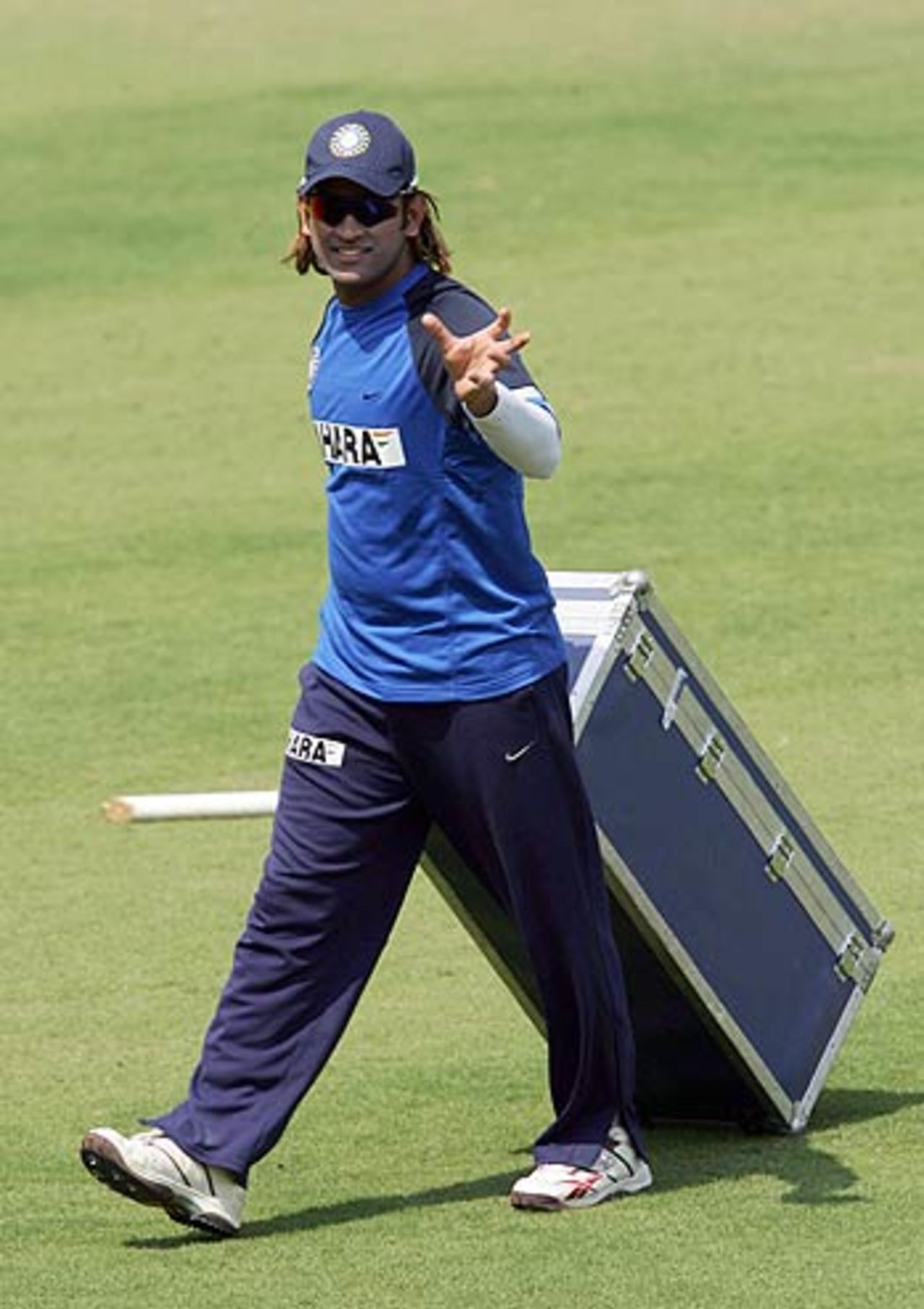 Mahendra Singh Dhoni walks back to the pavilion after a practice session on the eve of the first Test, Nagpur, February 28, 2006