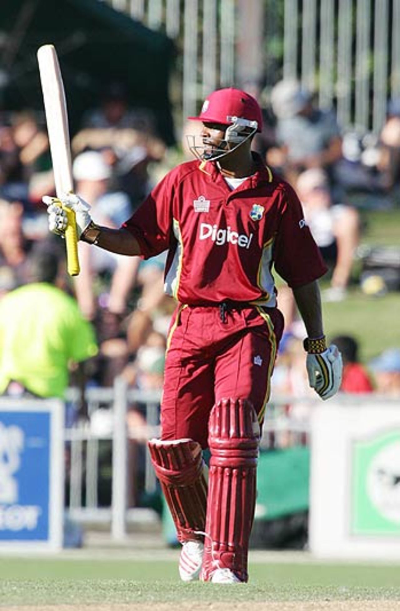 Runako Morton raises his bat after reaching his century, New Zealand v West Indies, 4th ODI, Napier, March 1 2006